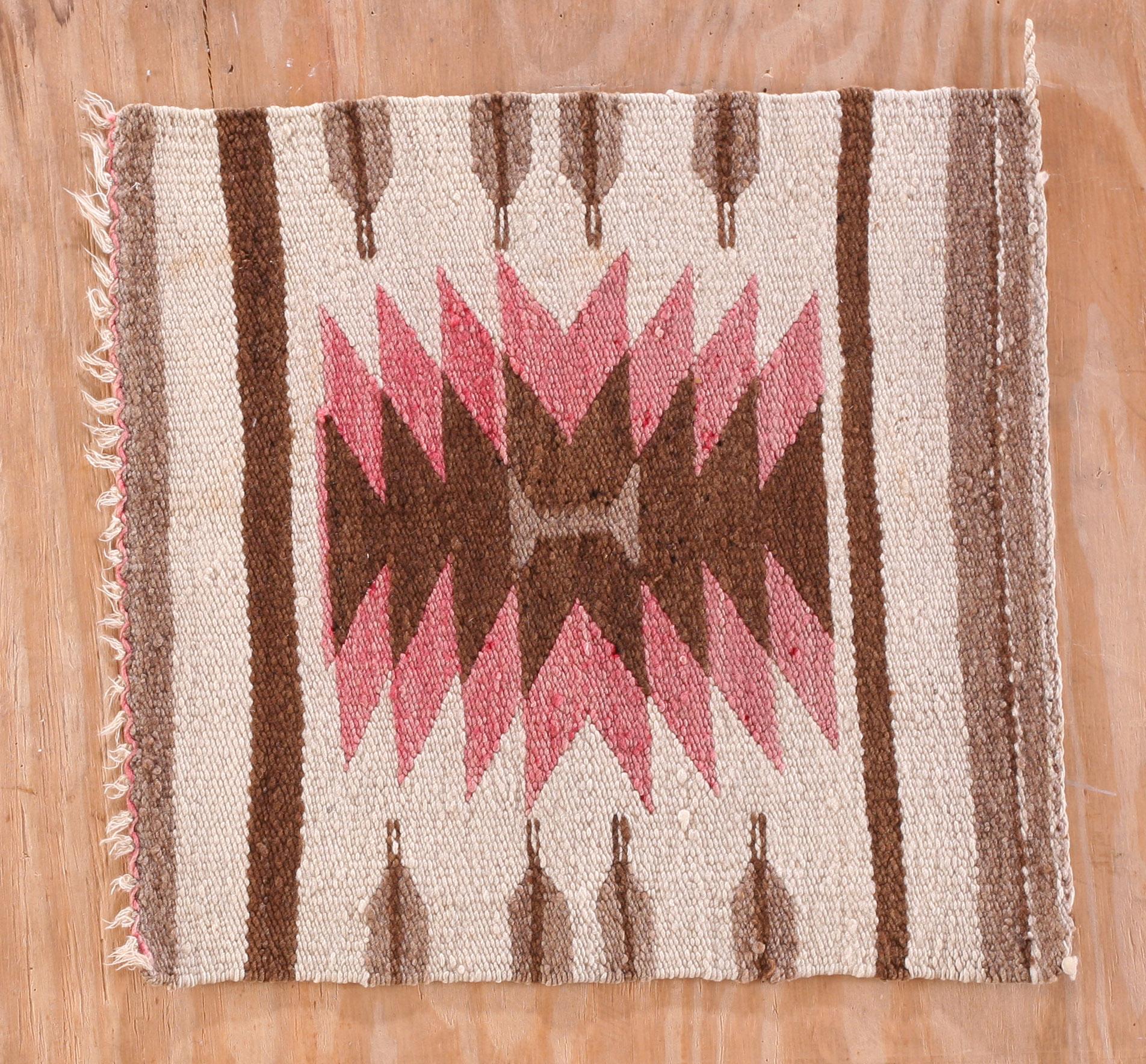 Antique Navajo rug with ivory color and size: 1'6