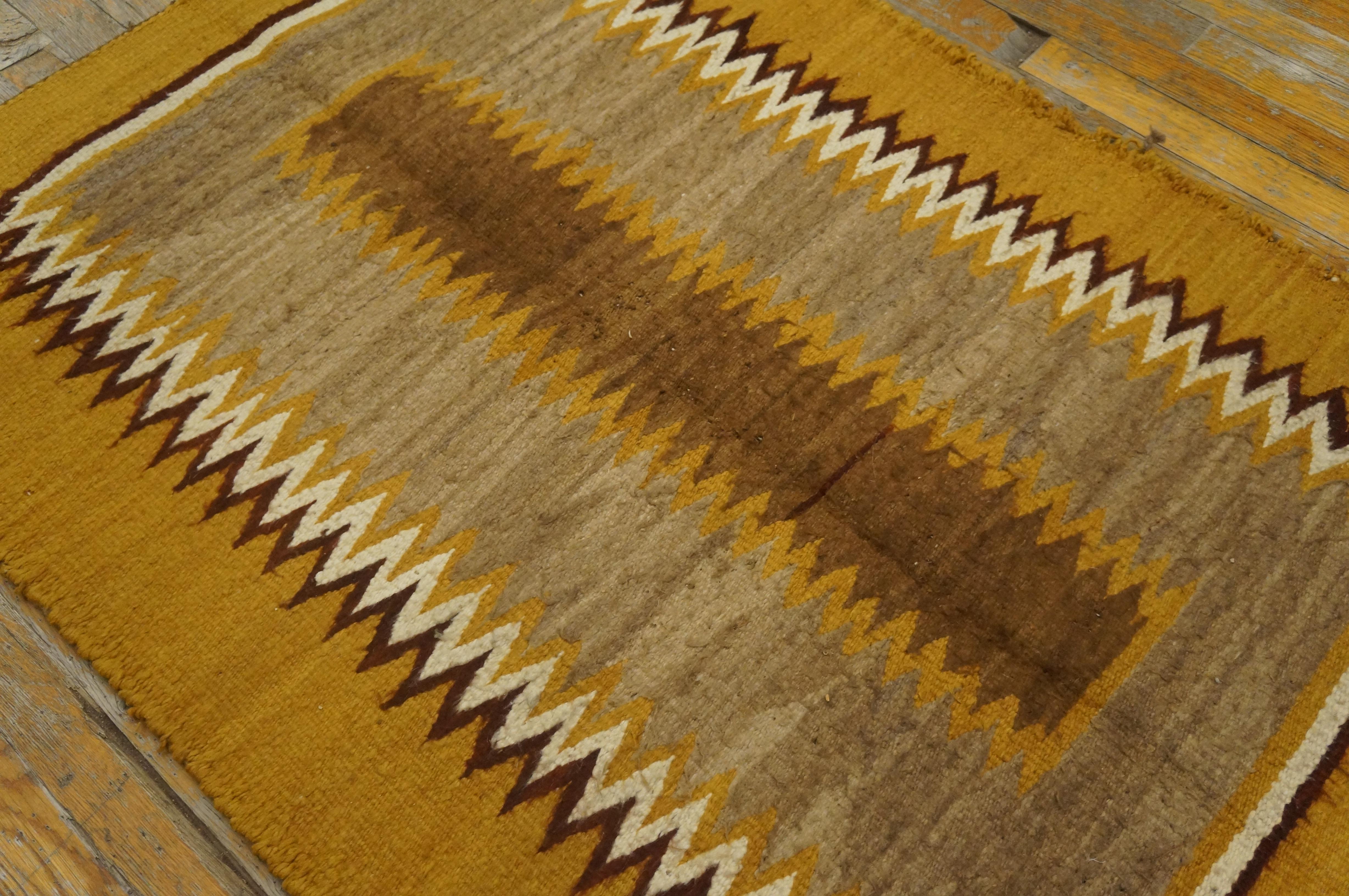 Antique Navajo rug with geometric design and 3' 0