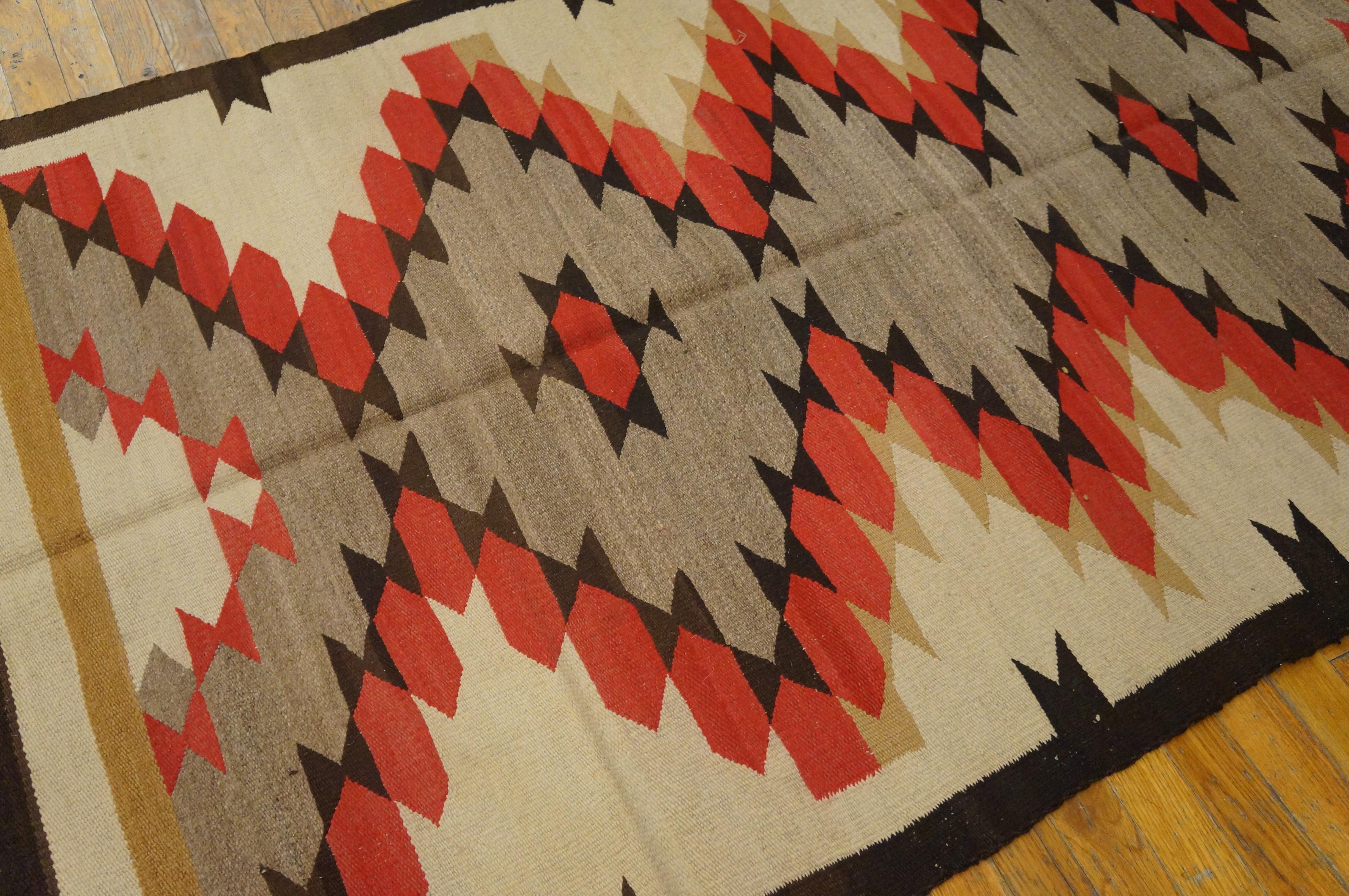 Antique Navajo rug with ivory color and 3' 9