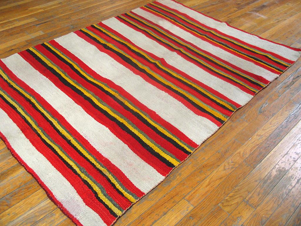 Antique Navajo rug with ivory color and 4' 0'' x 6' 0'' size.