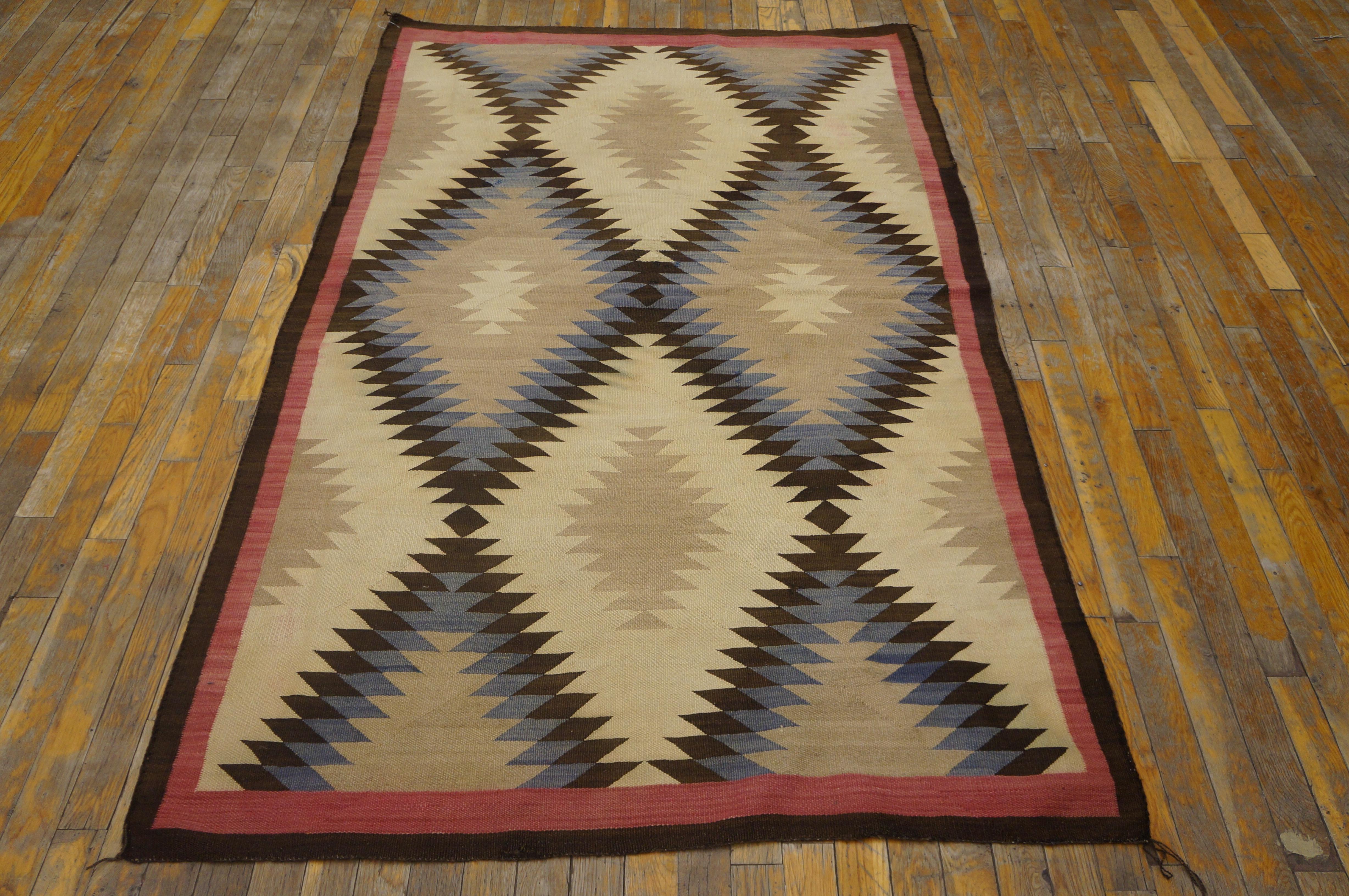 Antique Navajo rug with geometric design and 4' 0