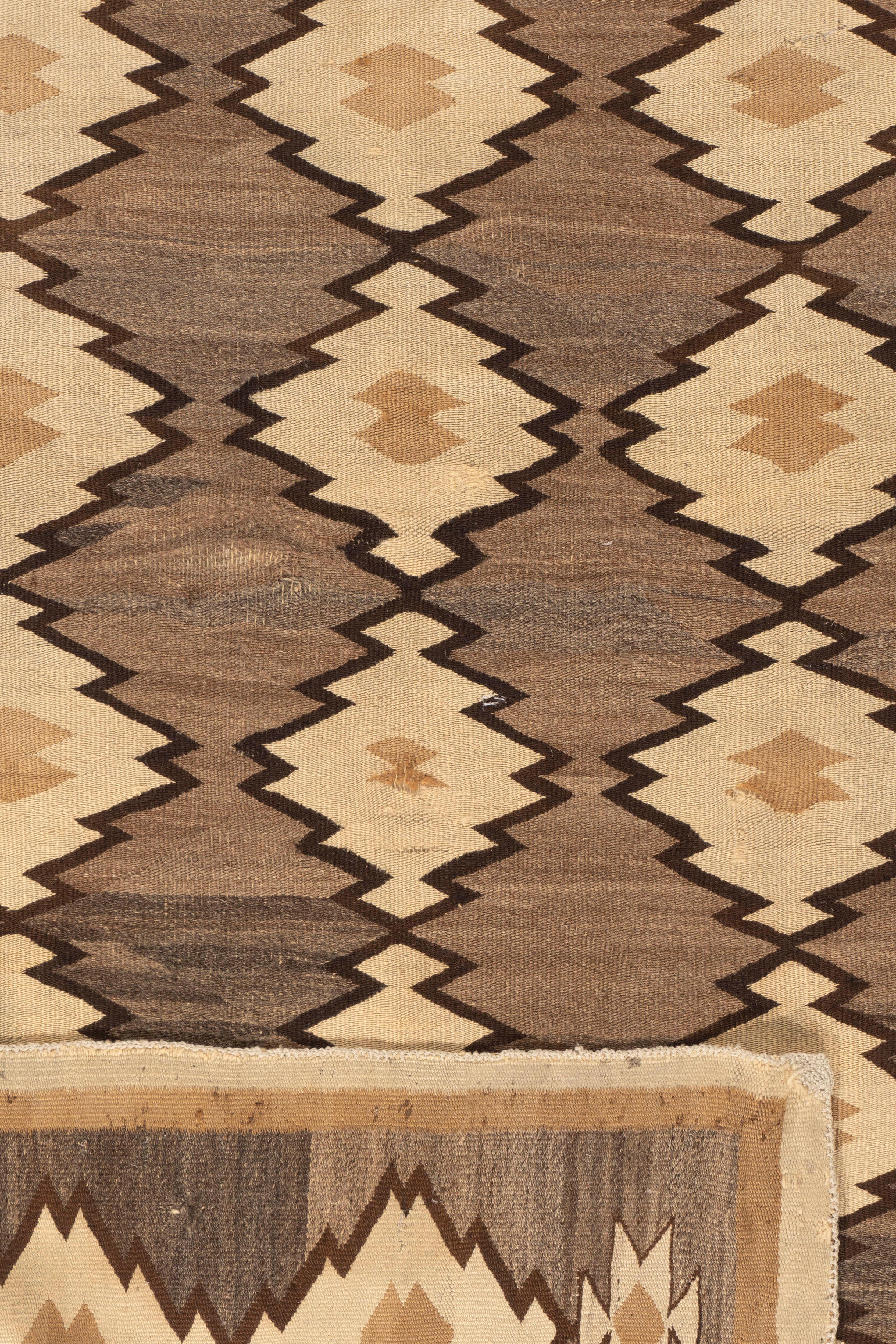Antique Navajo Rug 4'5 X 5'8. Navajos are usually in scatter sizes and larger, room size pieces are both extremely rare and highly desirable . As perpetually fashionable as they are collectible, traditional Navajo rugs, skillfully woven by members