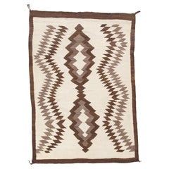 Antique Navajo rug circa 1930 two-tone brown diamond zigzag pattern natural wool