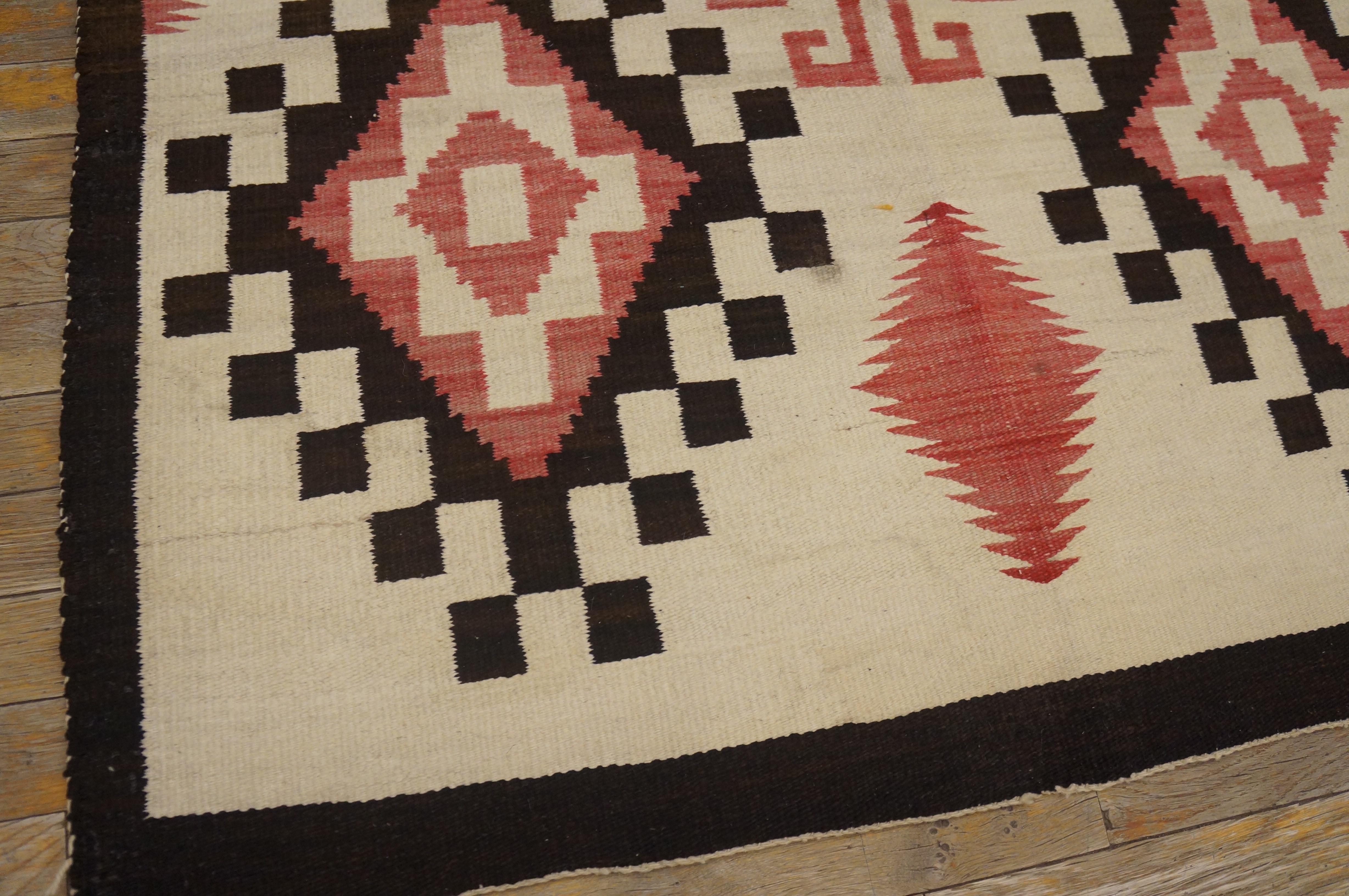 Antique Navajo rug with a ivory color, size 3'5