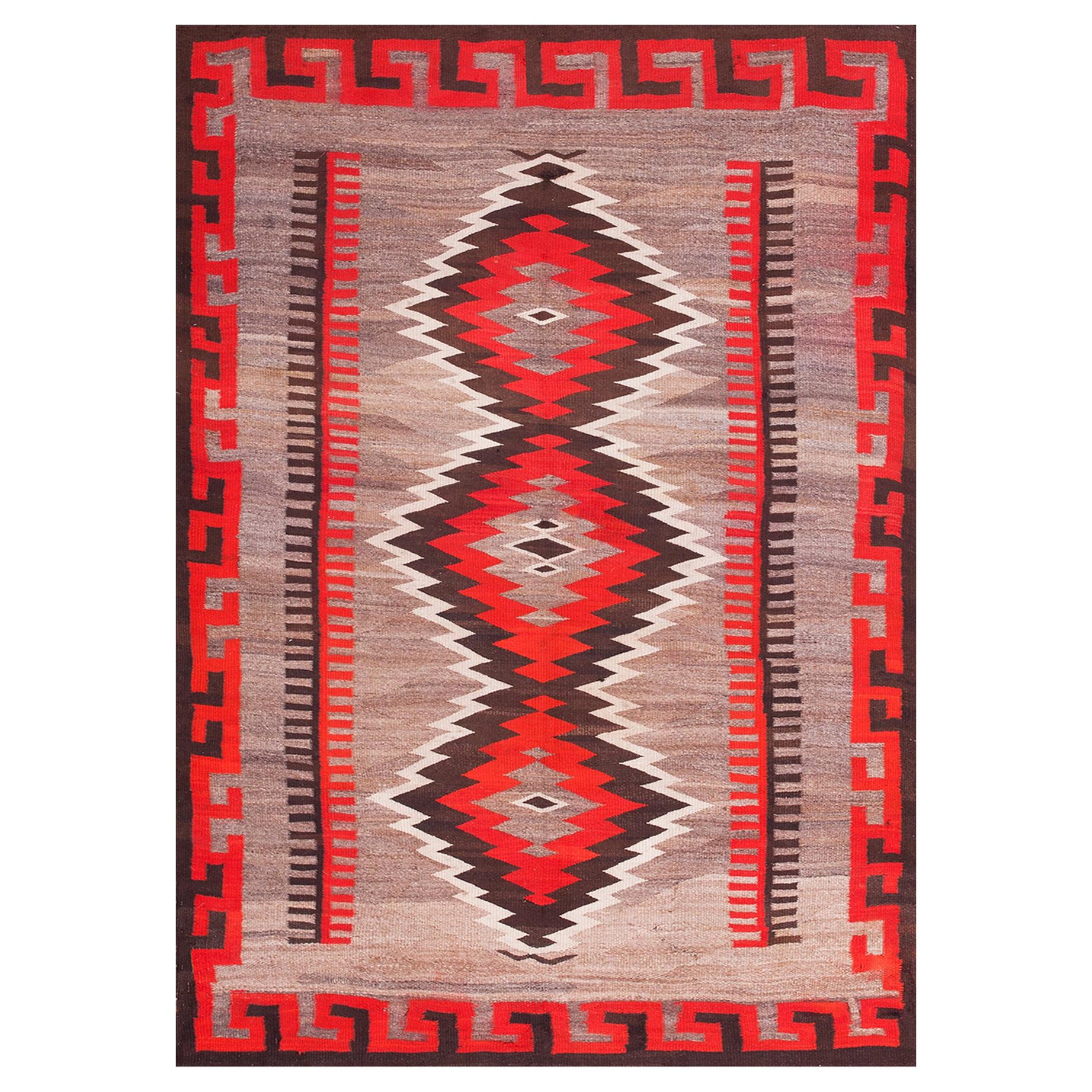 Early 20th Century Navajo Carpet ( 4'10" x 7' - 147 x 213 ) For Sale