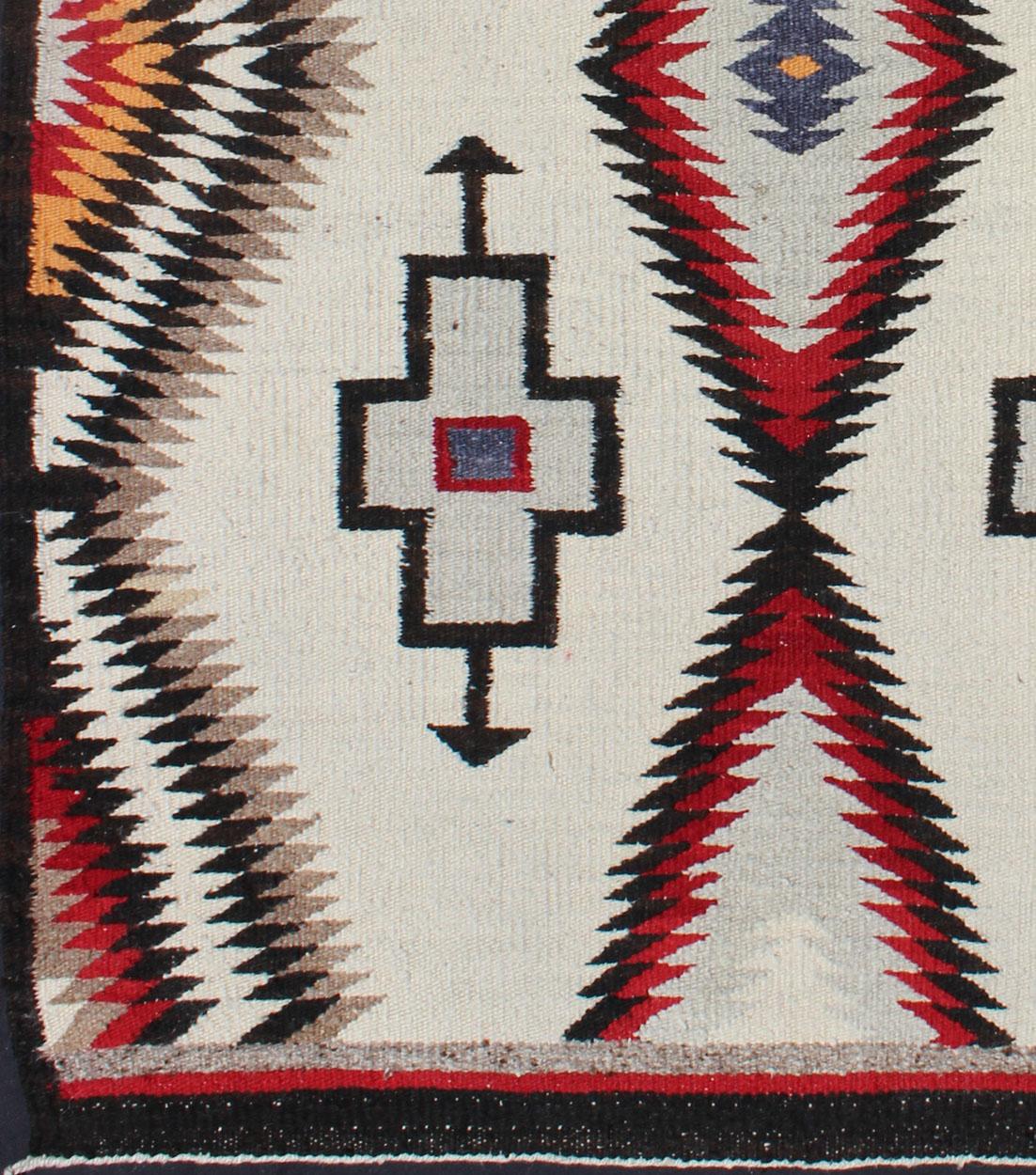 American Antique Navajo Rug in Gray, Ivory, Black, Orange, and Red For Sale