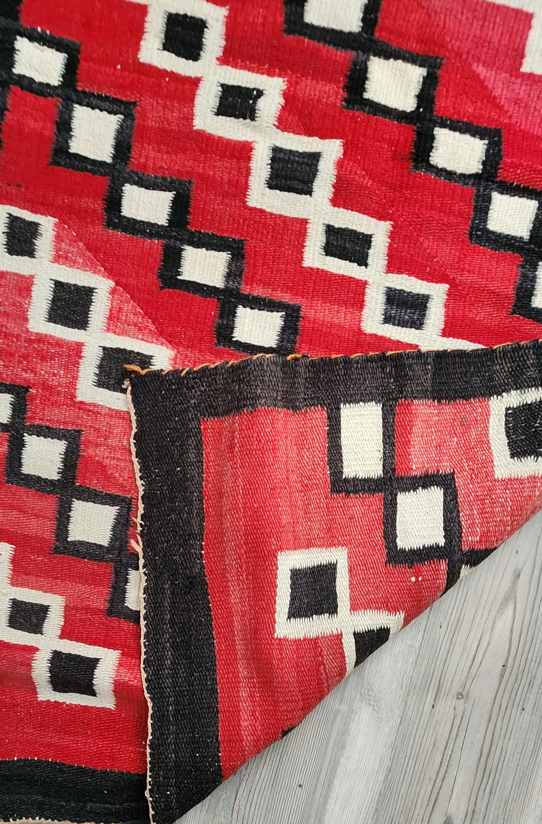 Circa 1880 Navajo weaving with a very elegant, unusual and modern design. Nice mottling of the natural colors, especially in the reds. All images taken in natural daylight.
This is a very bold weaving. This item is in good, as found condition.