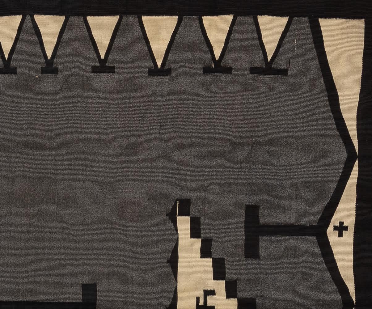 This one of kin Navajo features neutral tones and a unique design patterned. The Whirling log dates back dates back to the mid 1800s in Navajo weavings. The whirling log is a sacred symbol and represents good luck, protection and a positive well