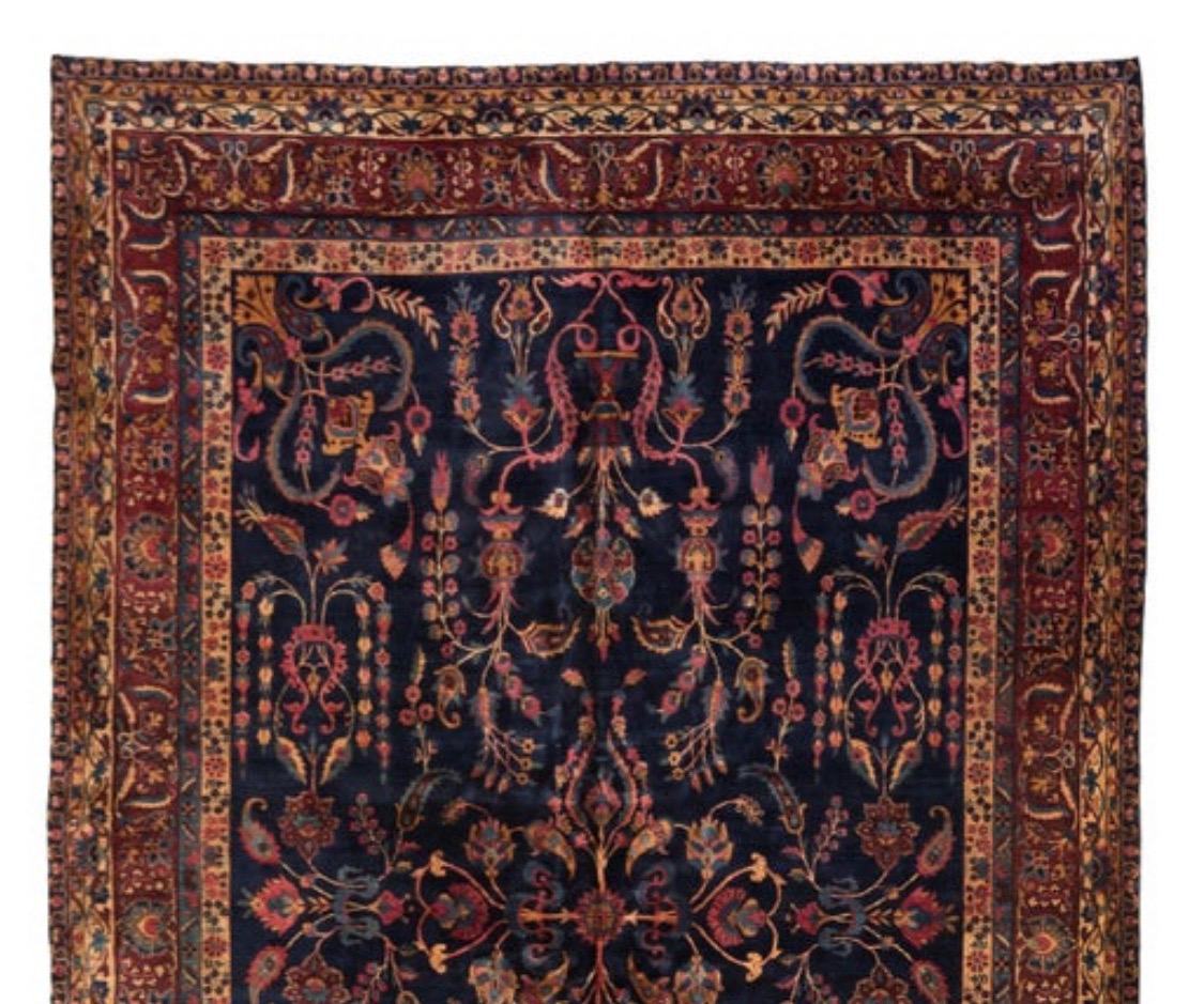 Antique Navy Blue and Gold Floral Persian Kirman Rug, circa 1920s-1930s In Good Condition For Sale In New York, NY
