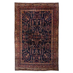 Used Navy Blue and Gold Floral Persian Kirman Rug, circa 1920s-1930s
