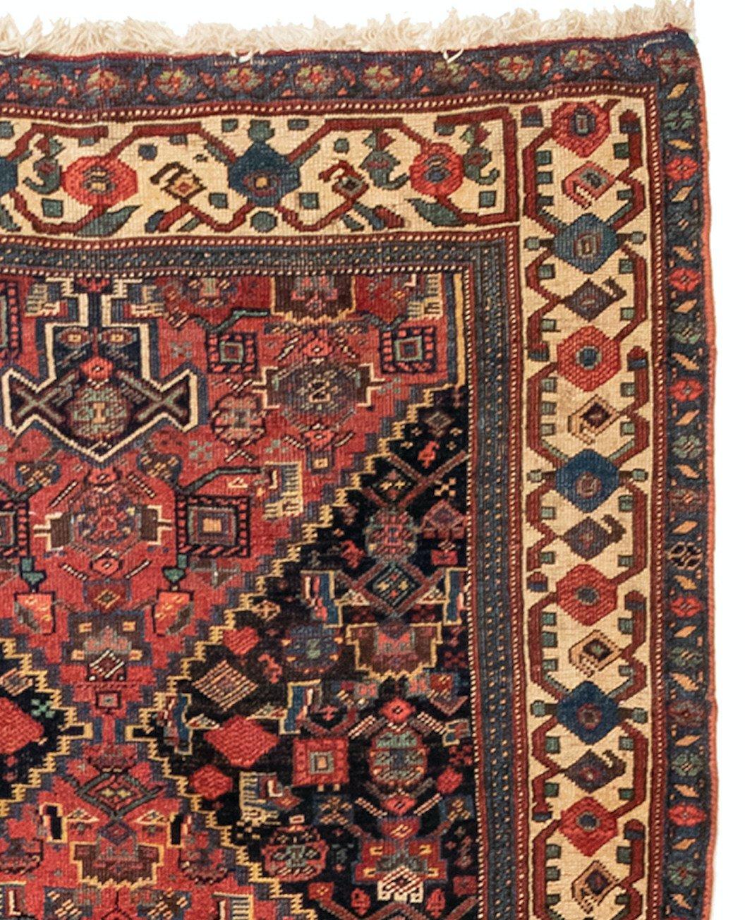 This is a lovely antique navy blue and ivory Persian Bijar rug hand knotted in Iran in the 1900s and measures: 4.6 x 14.7 ft.

Bijar rugs are mainly woven in the town of Bijar and its surrounding villages. Bijar is located in the province of