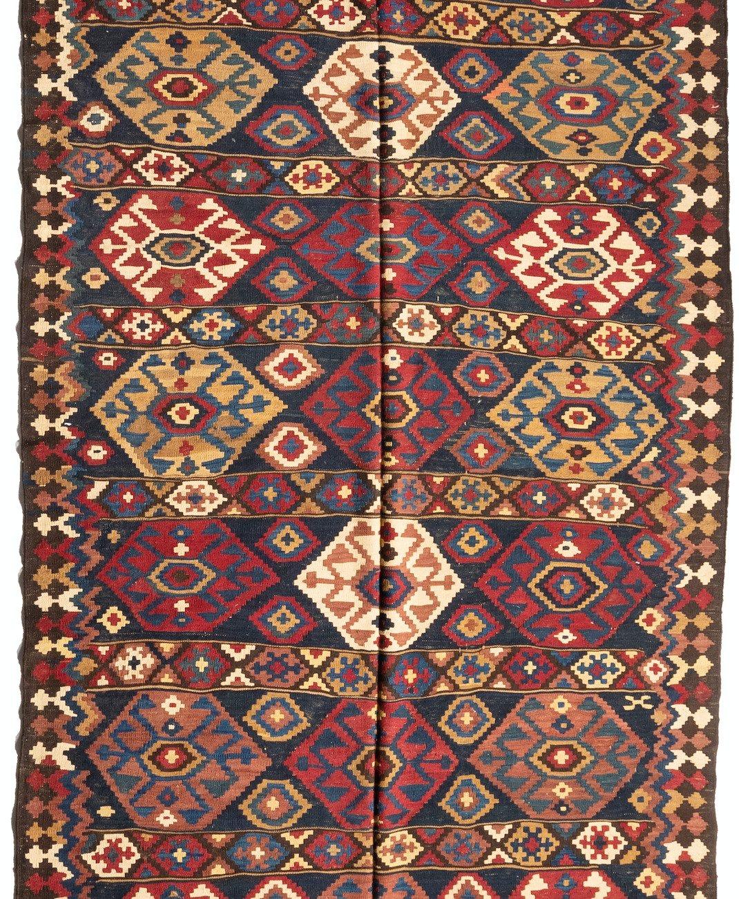 This lovely antique Persian Ghashgai Kilim carpet measures 6.5 x 18.9 ft. and is from the 1950s.

Provenance: Bonhams Auction House, London, UK.
 
   