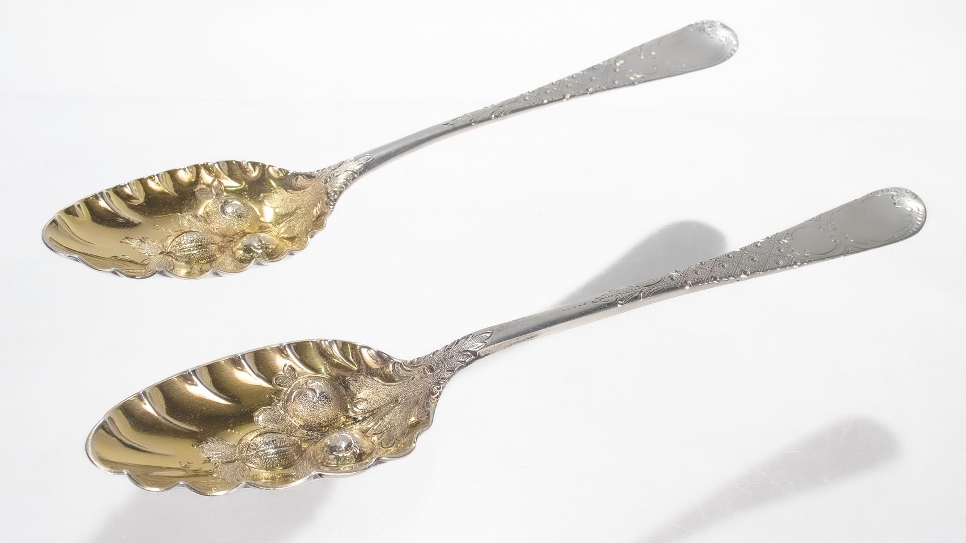 Antique Near Pair of Georgian Sterling Silver Gilt Decorated Berry Spoons In Good Condition For Sale In Philadelphia, PA