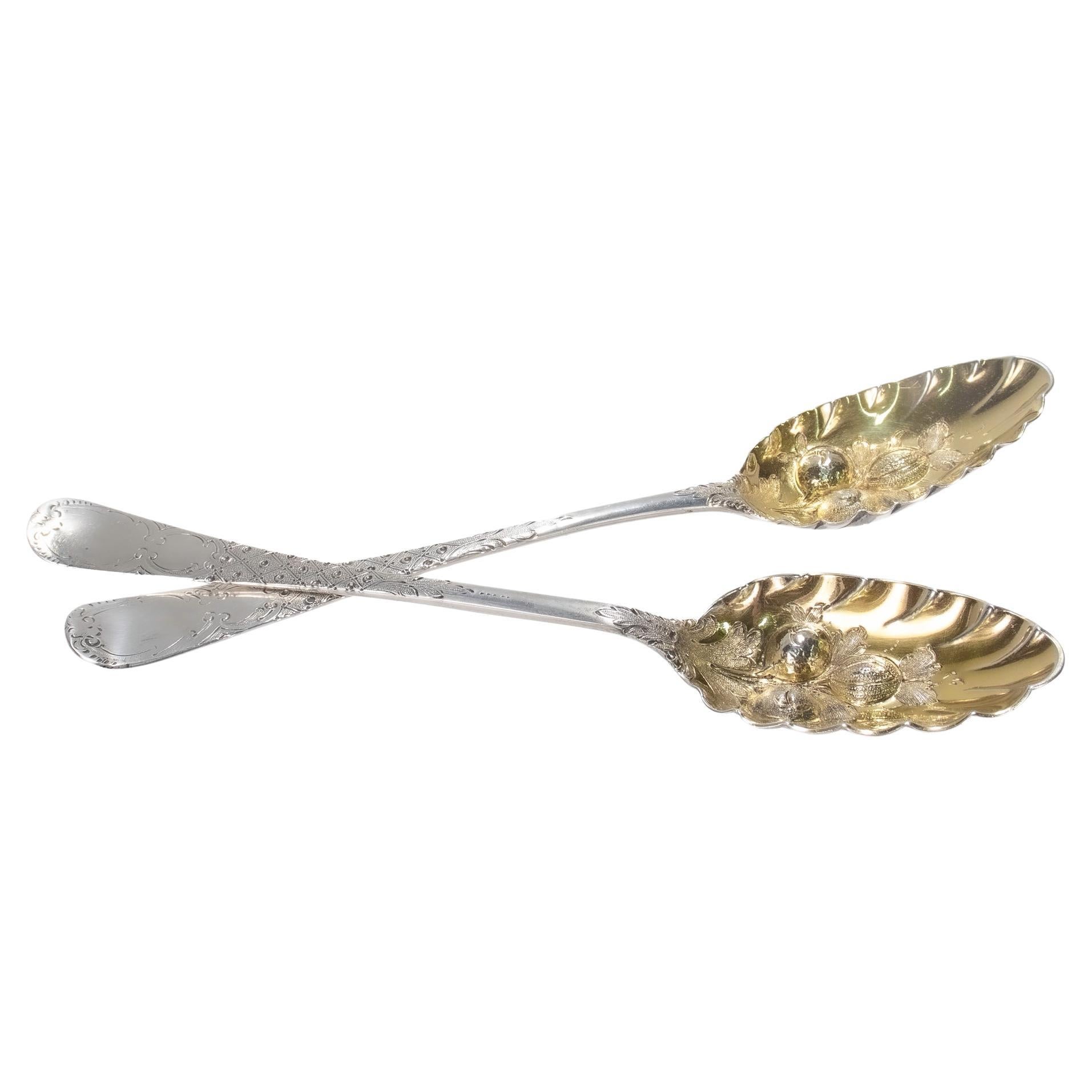 Antique Near Pair of Georgian Sterling Silver Gilt Decorated Berry Spoons For Sale