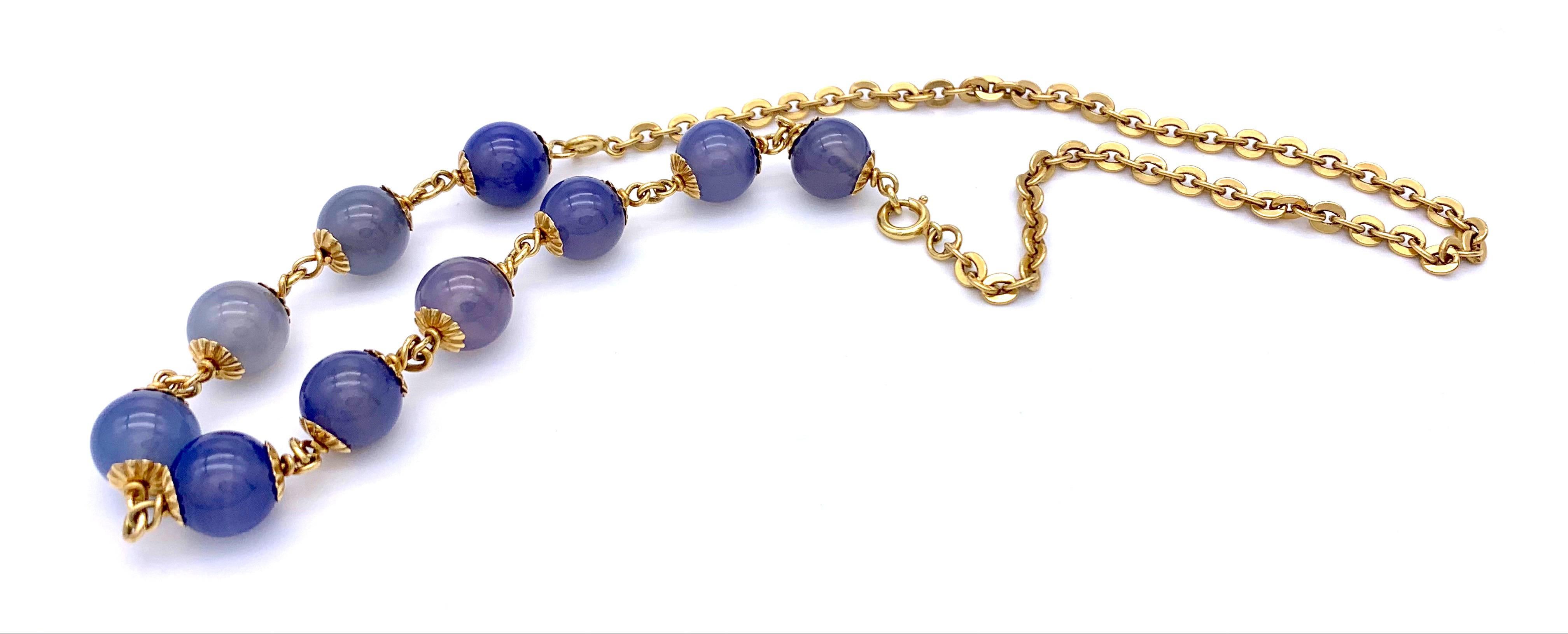 This elegant chalcedony bracelet has been joined to a length of 18 karat gold chain in an absolute matching bright warm gold hue to make up a necklace.
The bead bracelet on its own measures 29cm and weighs 21.48 grams. 