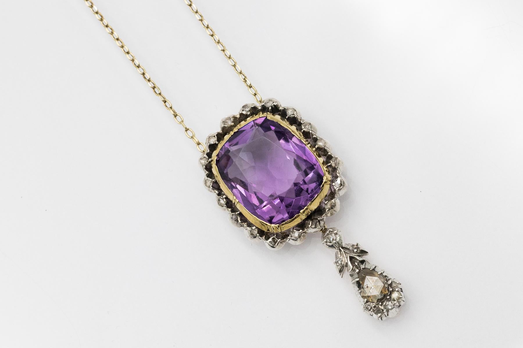 A vintage necklace with a cushion-cut amethyst weighing approximately 18 carats and Dutch rosette-cut diamonds weighing approximately 0,68 carats in total.

The necklace is made of 14-karat yellow gold and silver elements in a diamond