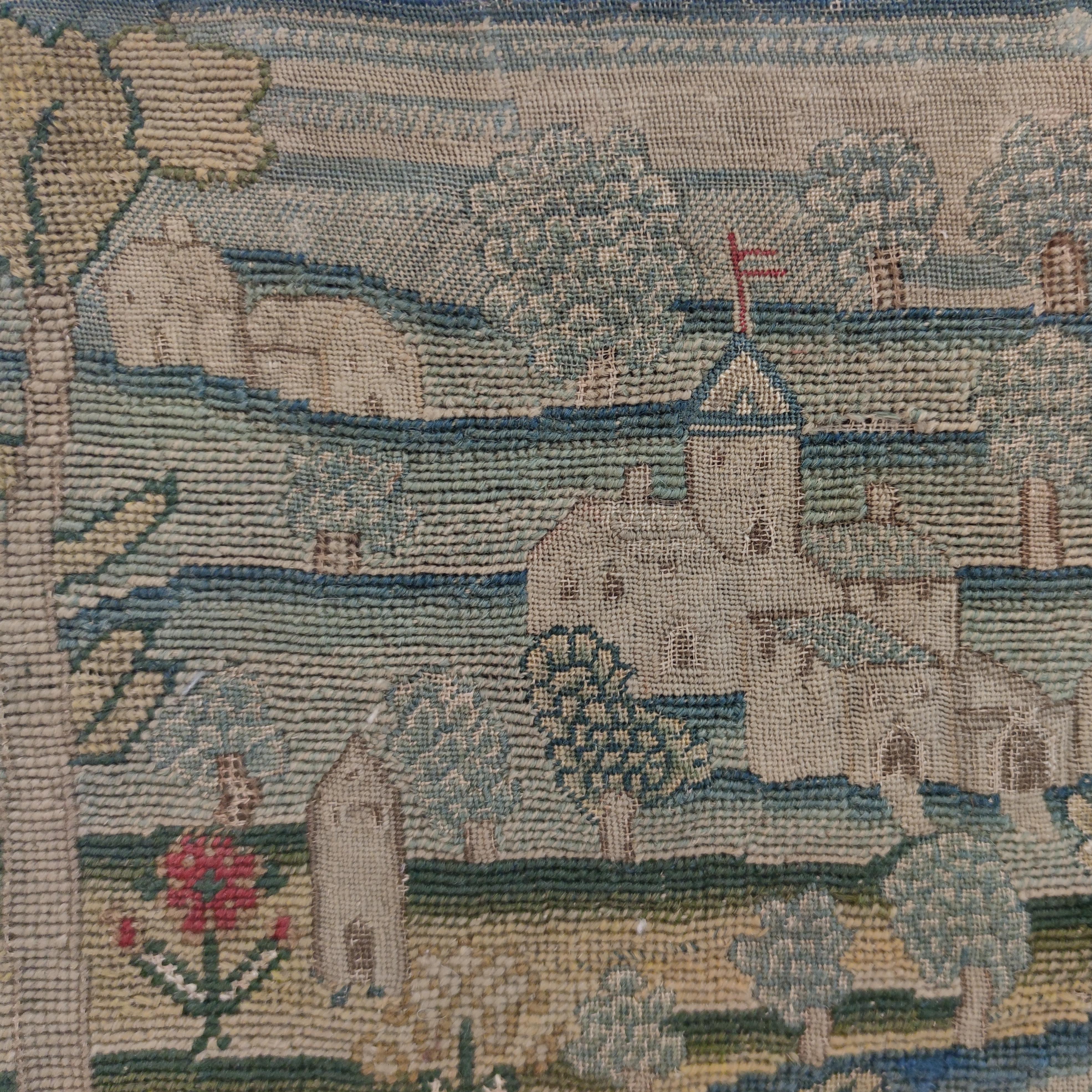 Finely worked in gros and petit point in silk and wool, this English needlepoint picture dates to the early part of the 17th century. It is complete with the side selvedges and was originally commissioned as a small hanging. It is now mounted on a