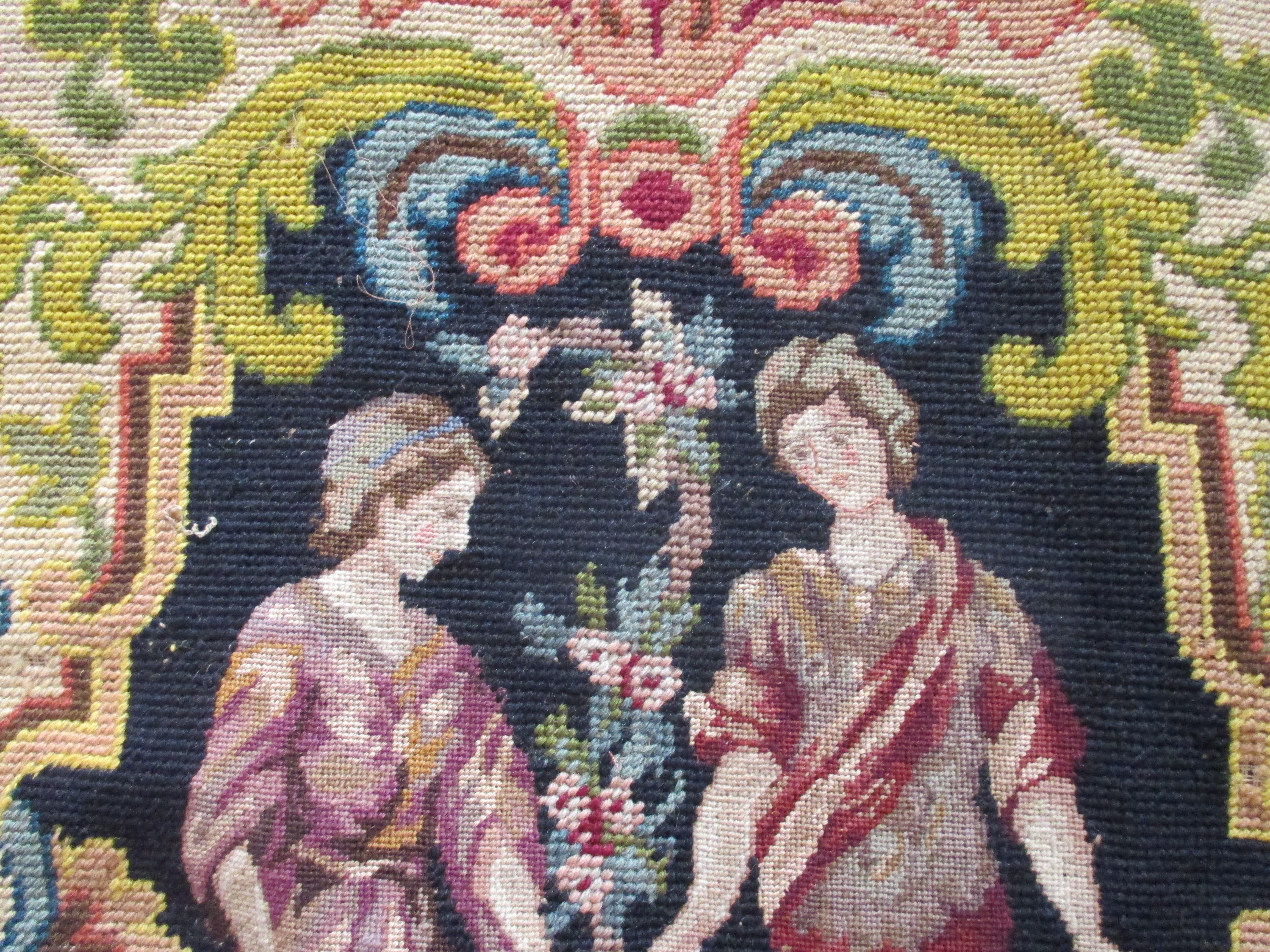 Antique tapestry fragment depicting a garden scene.
A young couple strolling thru the garden.
Ideal for upholstery or a pillow.
In shades of black, gold, brown, yellow, green, red and blue
Size: 25