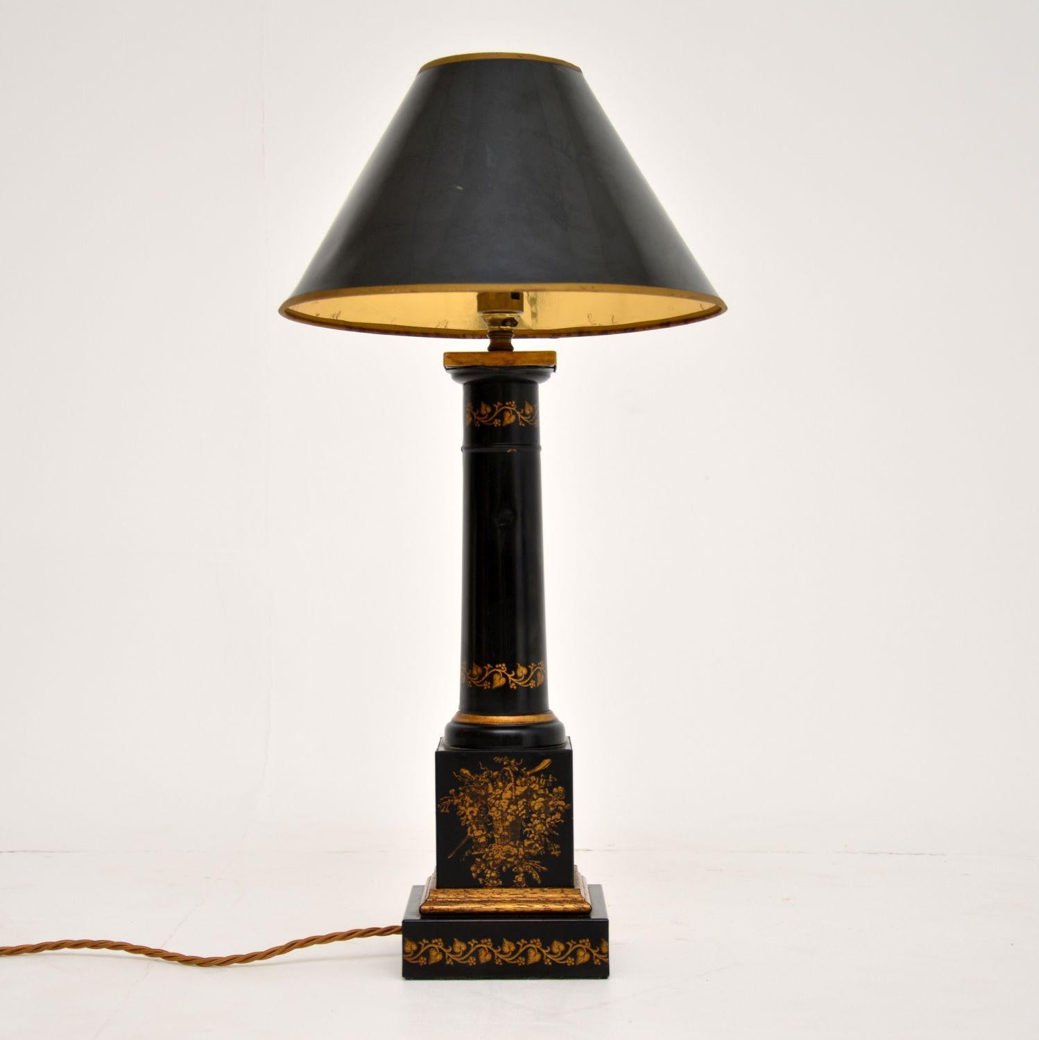 Antique French Empire neoclassical style Tole metal table lamp in excellent original condition with floral decoration.

This lamp has a very bold form. The shade which was on this when we acquired it, is perfect for the base and is in okay