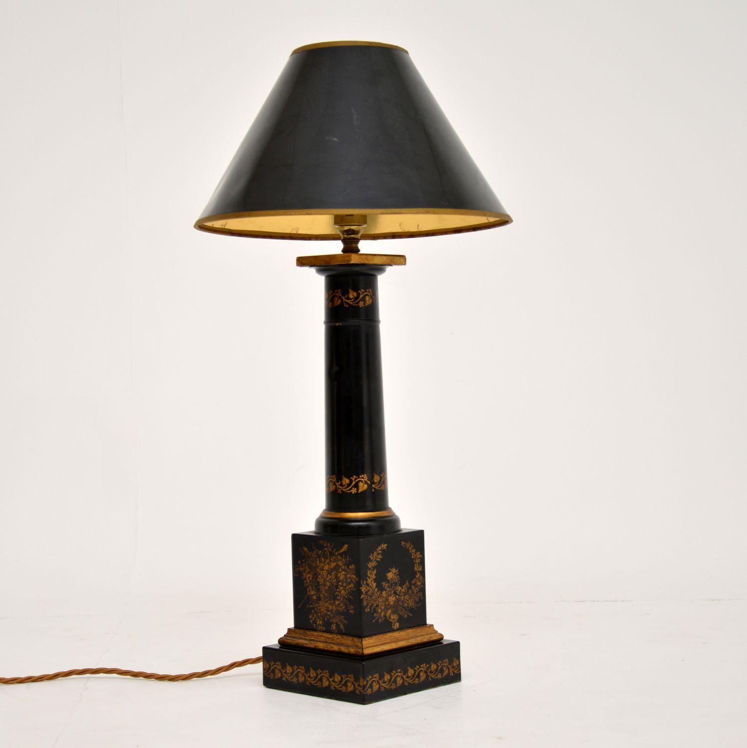 Antique French Empire Neoclassical style Tole metal table lamp in excellent original condition with floral decoration.

This lamp has a very bold form. The shade which was on this when we acquired it, is perfect for the base & is in okay condition,