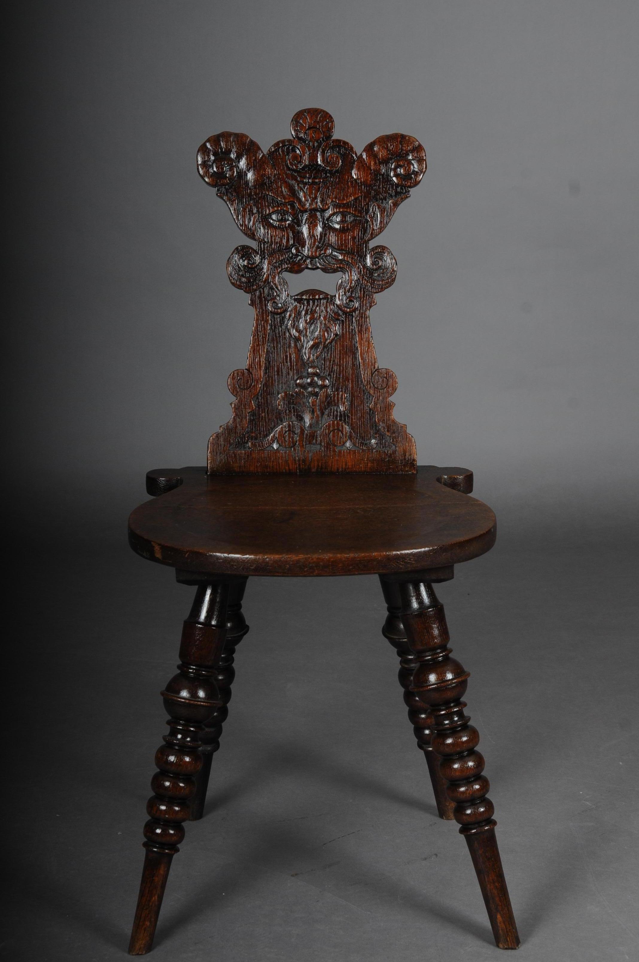 Antique neo Renaissance board chair historicism circa 1870, oak C.

Solid dark oak. Straight seat on turned and tapered legs.
Backrest with plastic mascarons. Extremely decorative and rare historicism chairs with rich carving.

(C-156).