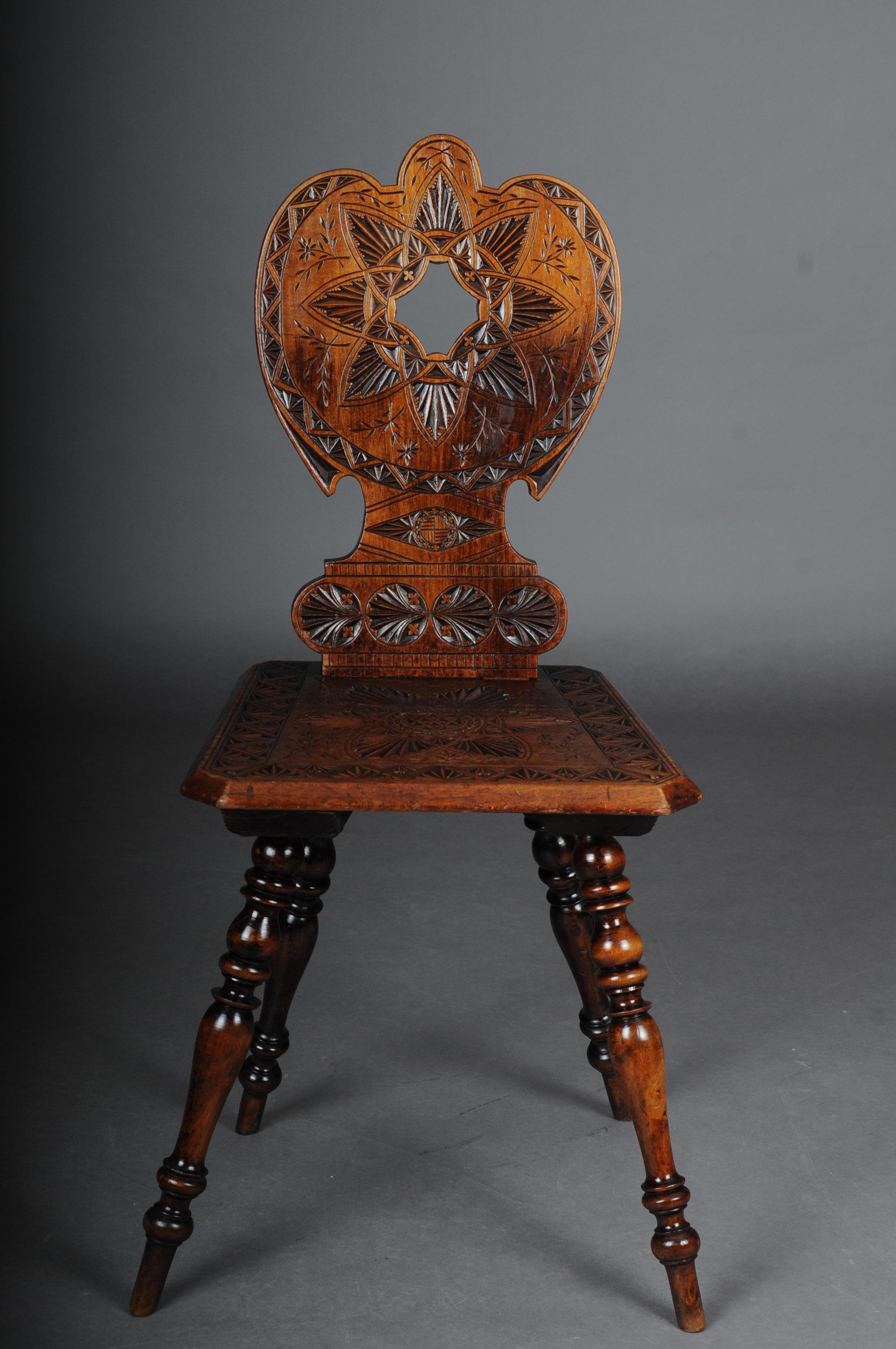 Antique neo Renaissance board chair historicism circa 1870, oak E.

Solid dark oak. Straight seat on turned and tapered legs.
Backrest with Davidstern notched carvings. Different decorative and false historicism chairs with rich