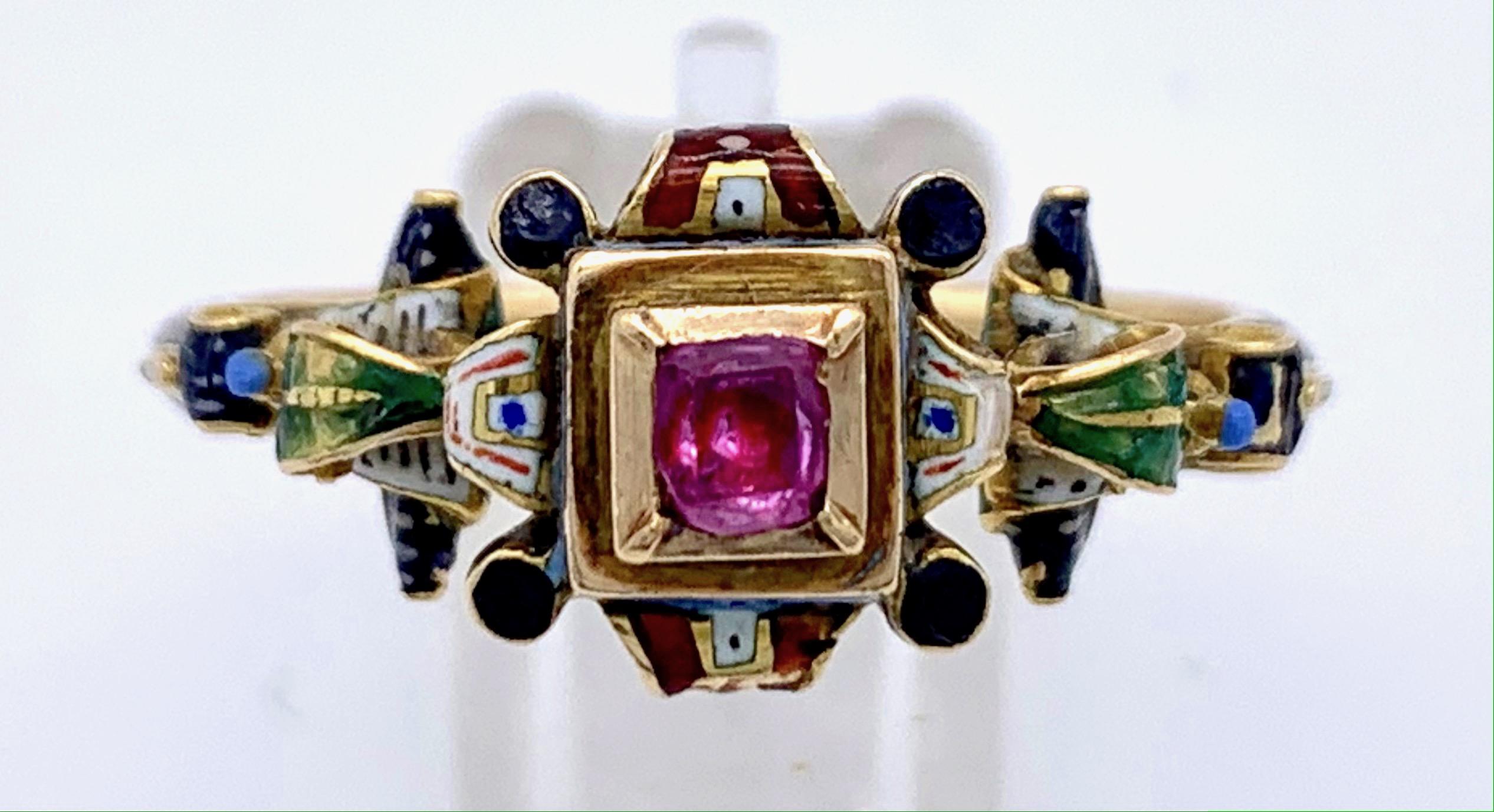 Fantastic and rare polychrome enamelled gold ring in exquisite Neo Renaissance Style of the 1860's. The wonderful and intricate enamel work is executed on 18 karat gold. The ring is set with a square cut pink topaz. The inside of the shank is also