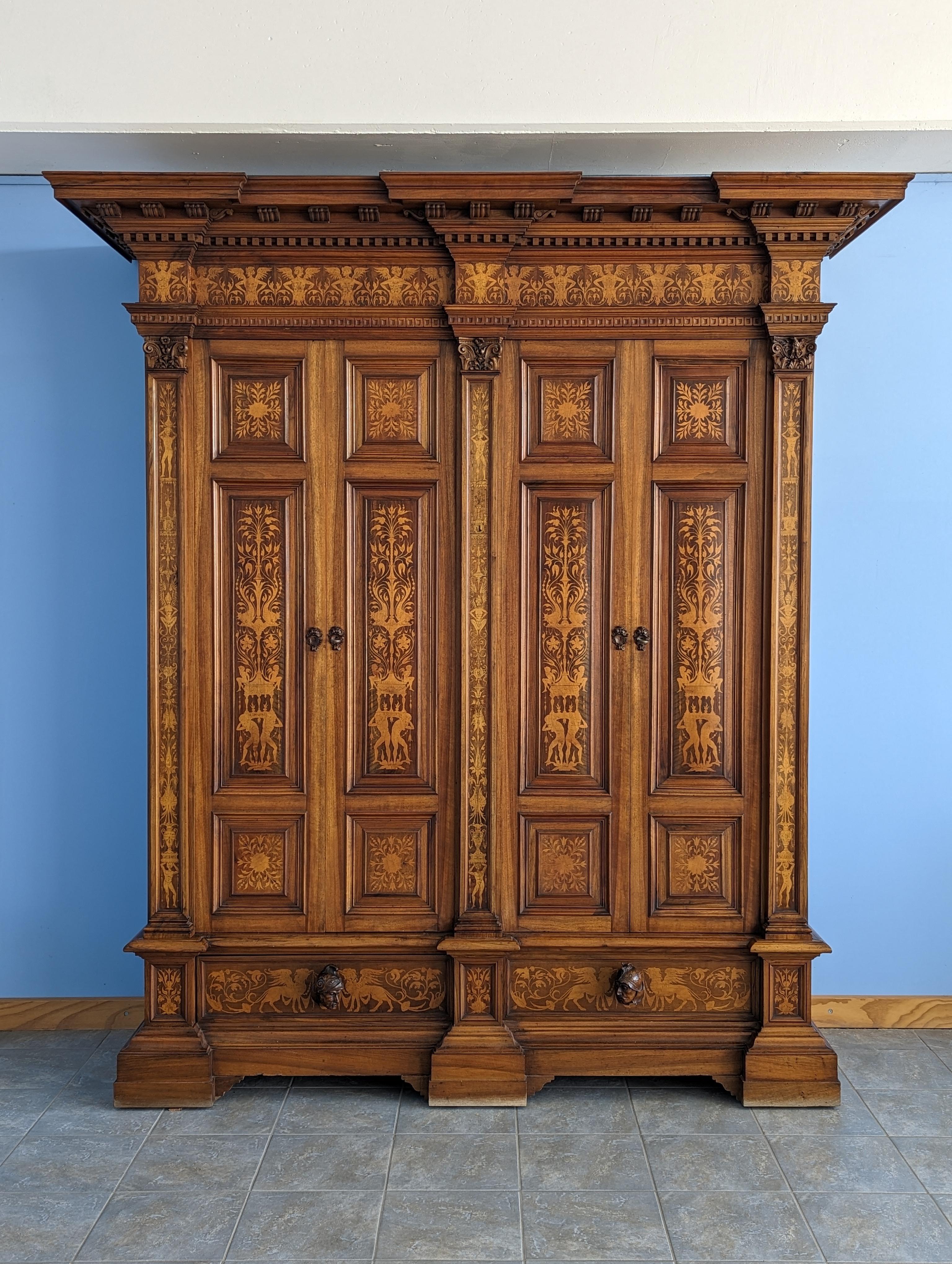 Antique Neo-Renaissance Walnut Armoire with Inlays and Four Doors, Late 19th C. In Good Condition In Traversetolo, IT
