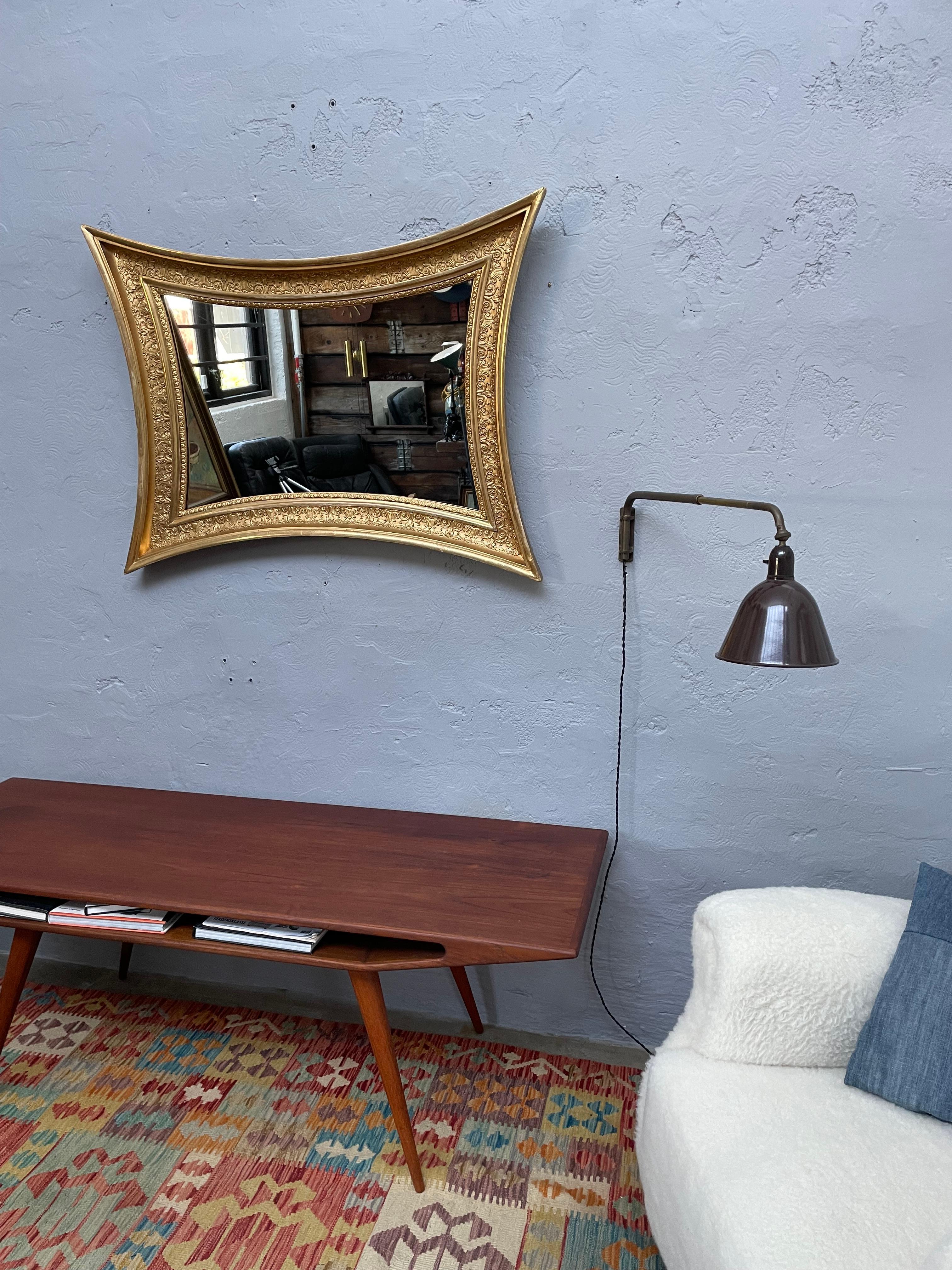 A large Neo Roccoco antique wall mirror from the 18th Century. 
In original solid condition with signs of age related wear and patina that just add to the look of this wonderful piece. 
The hanging string has been replaced on the back of the mirror.