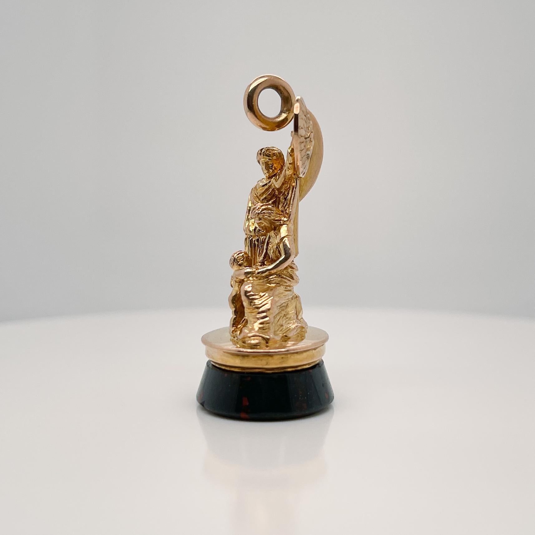 Women's or Men's Antique Neoclassical 18 Karat Gold Figural Watch Fob & Bloodstone Seal