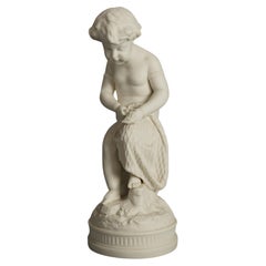 Antigua figura neoclásica de porcelana bisqueada de un querubín C1850