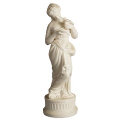 Figure néoclassique ancienne en porcelaine biscuit représentant une femme et un oiseau classiques, vers 1850