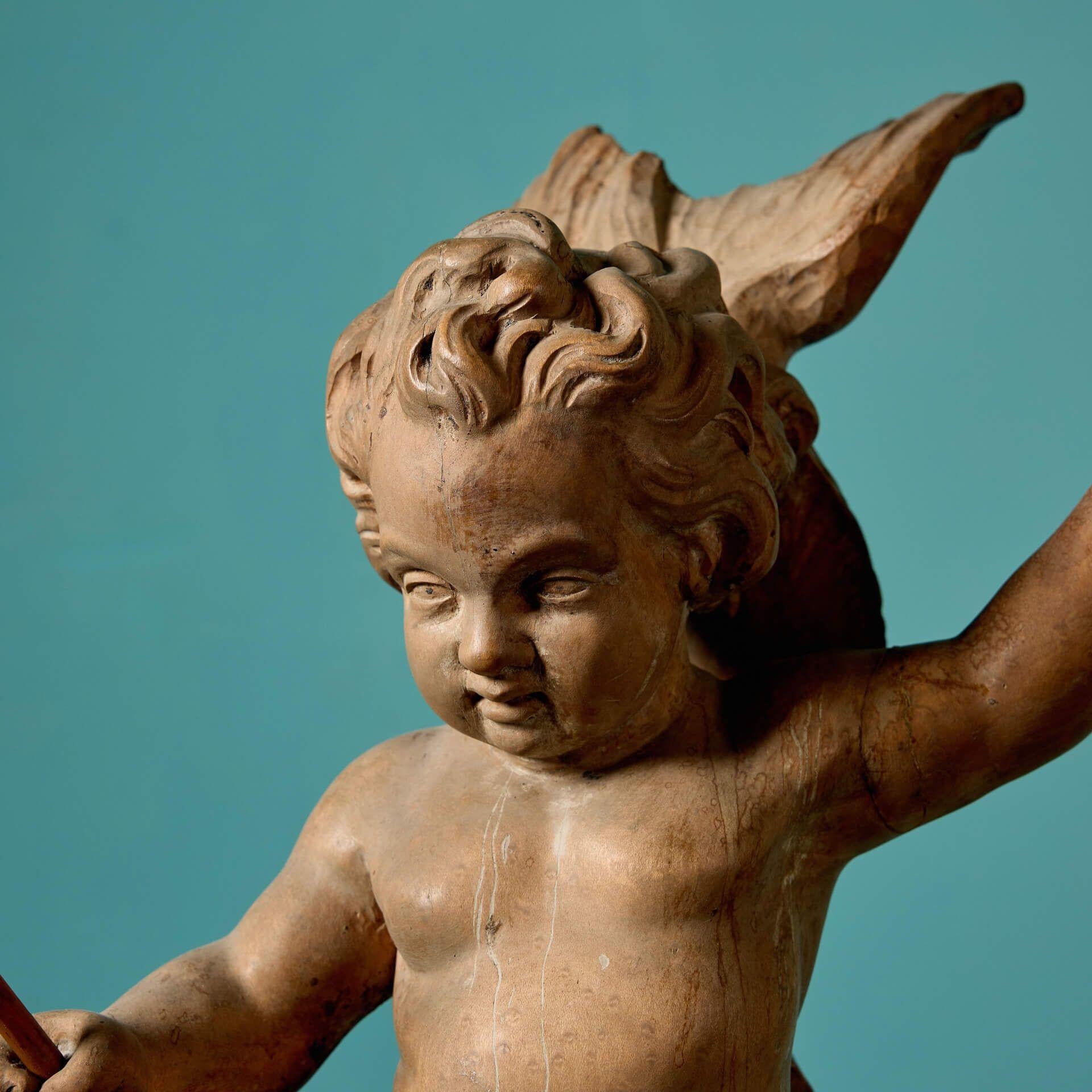 Antiker neoklassischer geschnitzter Cherub und Delphin (Neoklassisch) im Angebot