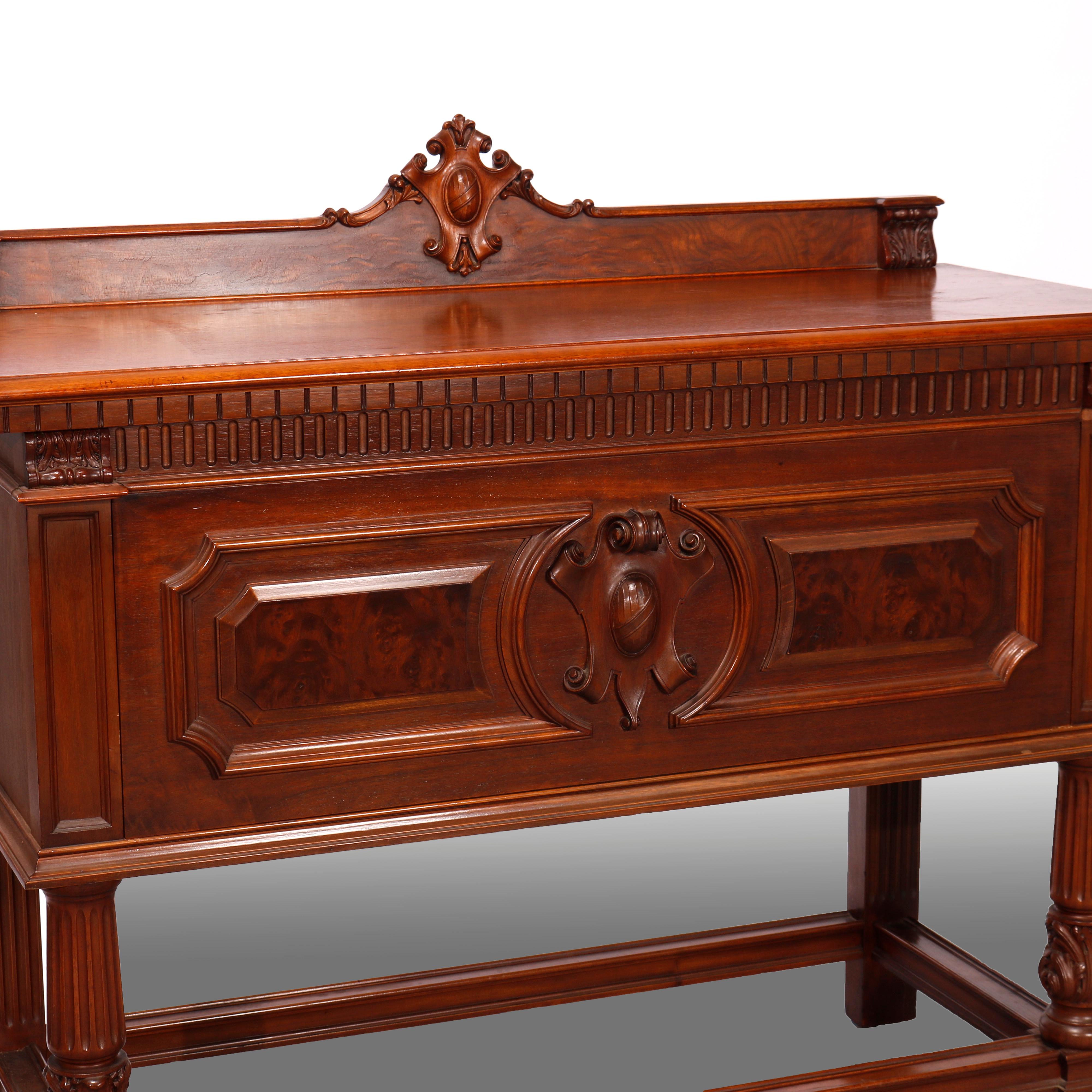 An antique neoclassical style server offers mahogany and burl construction with backsplash having carved cartouche over single drawer case with stylized shield, dental and scroll elements raised on legs terminating in melon form ball feet,