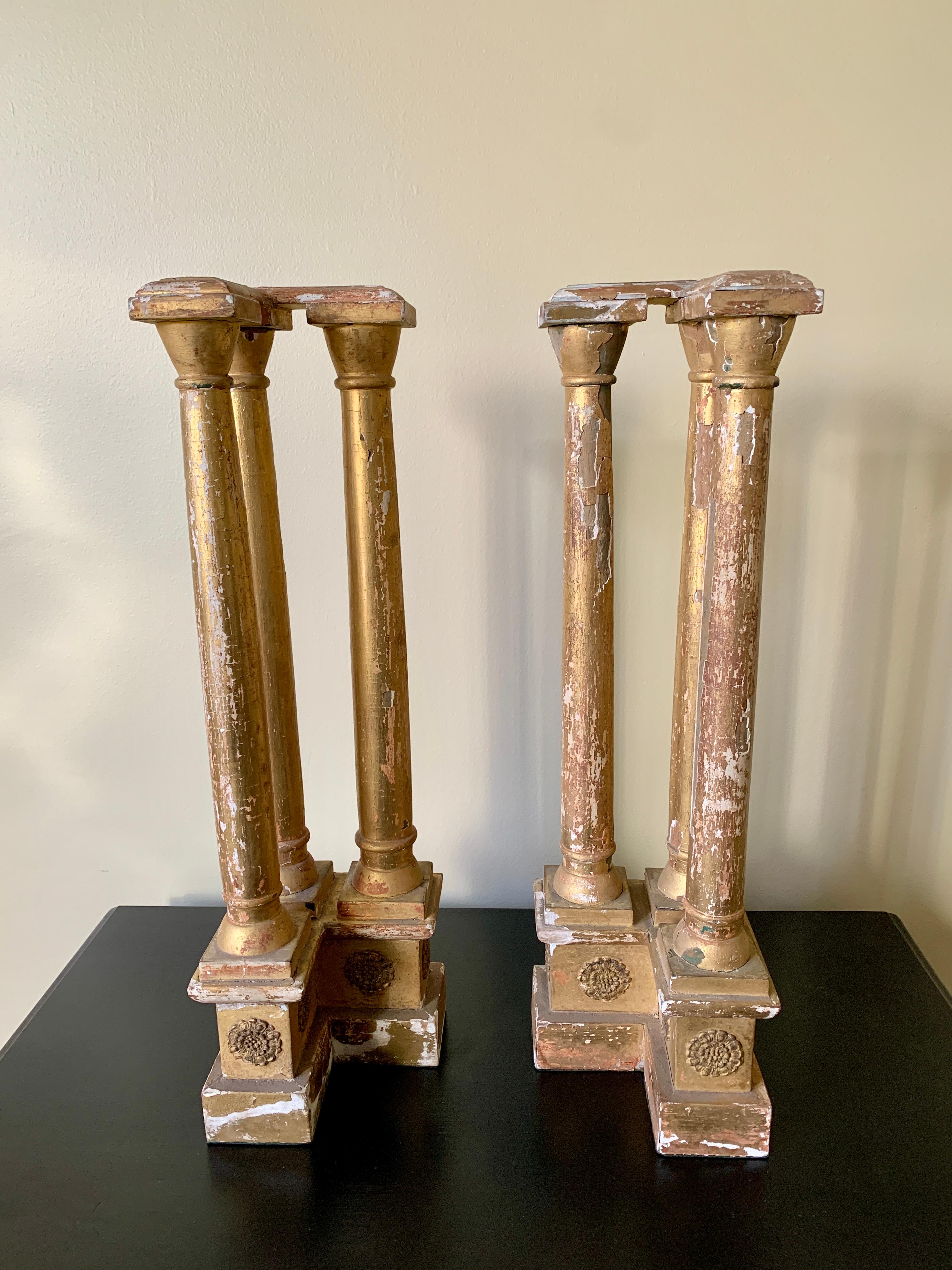 A stunning pair of Grand Tour or Neoclassical gilt wood architectural tabletop columns. 

Italy, Early 20th Century

Measures: 5.13