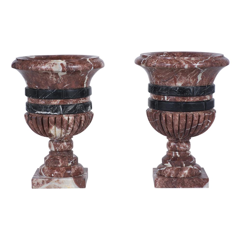 An extraordinary antique french garden Vases hand-crafted out of marble these pieces features carved details a rouge color marble with white veins with a beautiful patina polished finish. the elegant architectural handcrafted details will make these
