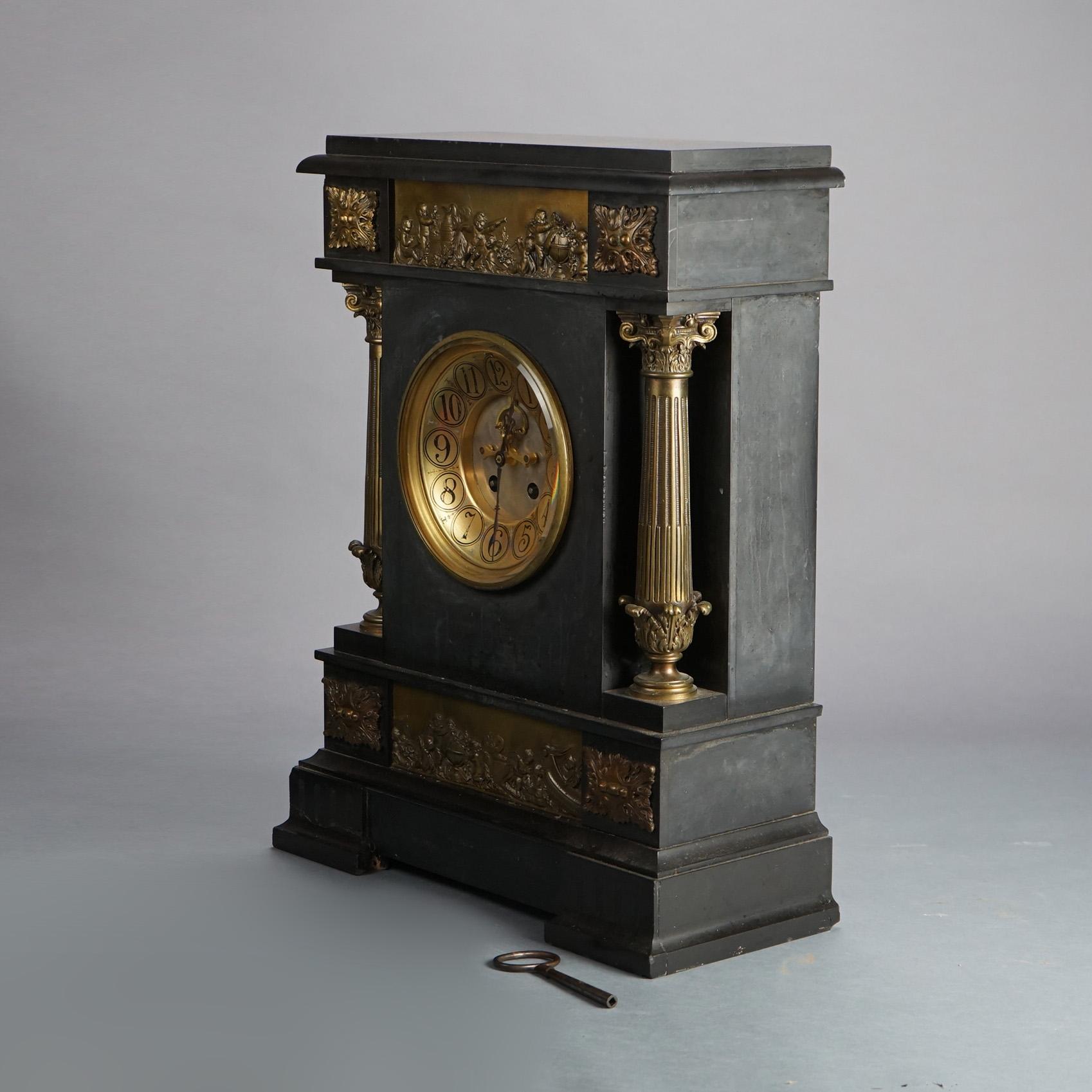 Antique Neoclassical Second Empire Black Marble Mantle Clock with Bronze Columns & Cupid Scene in Relief Frieze & Base Plaques C1880

Measures- 34''H x 74.5''W x 20''D

