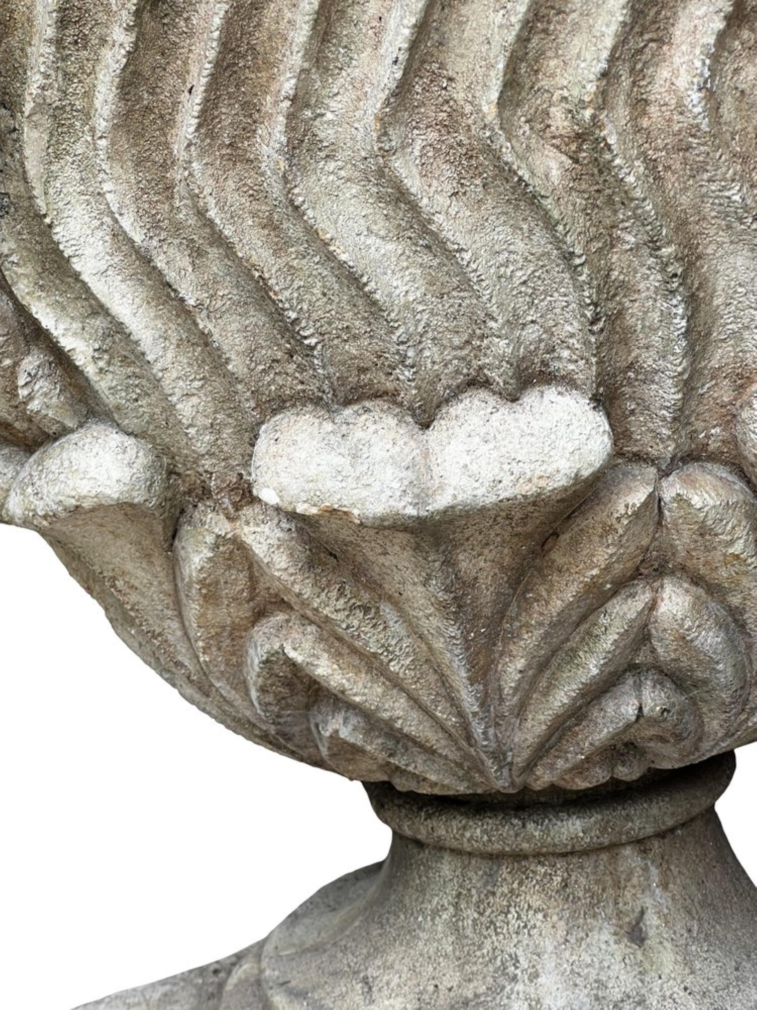 This Imposing Antique Urn, Crafted in the Neoclassical Style, Exudes Grandeur and Sophistication. Made from Heavy Stone, its Large Size Commands Attention and Adds a Sense of Architectural Elegance to Any Space. Adorned with Intricate Detailing and