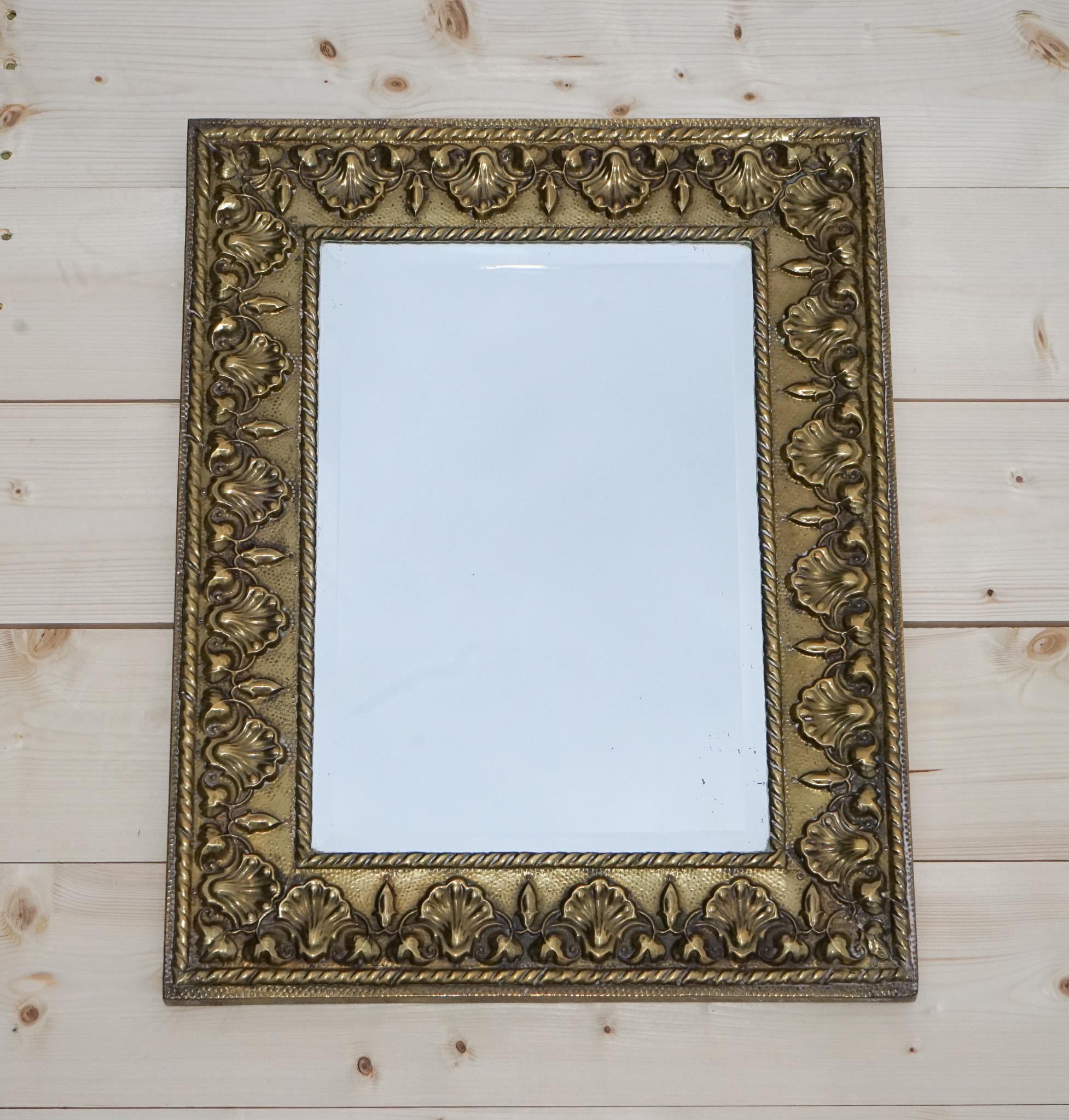 
Antiques of London



We are delighted to offer for sale this Antique Neoclassical Style Wall Mirror.

A rectangular mirror with brass, showcasing shells and bleeding hearts. This mirror is in the manner of Keswick Schools of Industrial Arts,