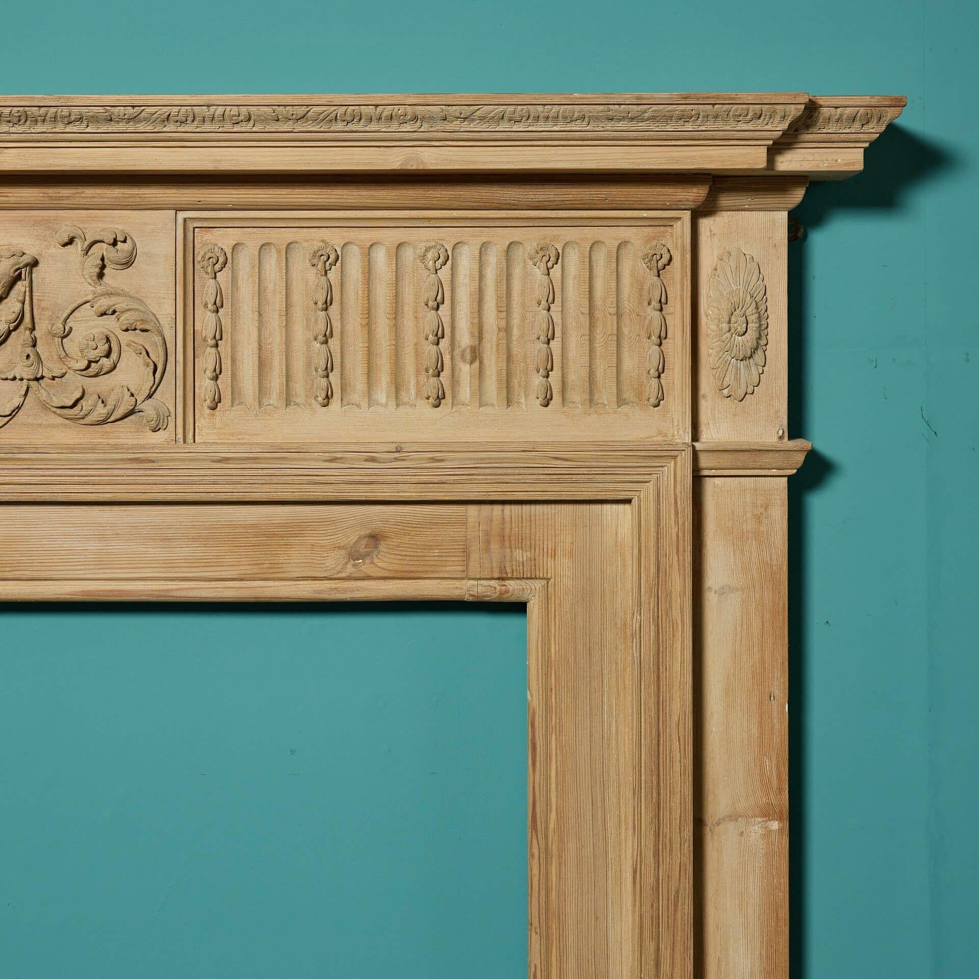 Hand-Carved Antique Neoclassical Style Carved Pine Fire Surround For Sale