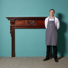 Antico caminetto in legno intagliato in stile neoclassico
