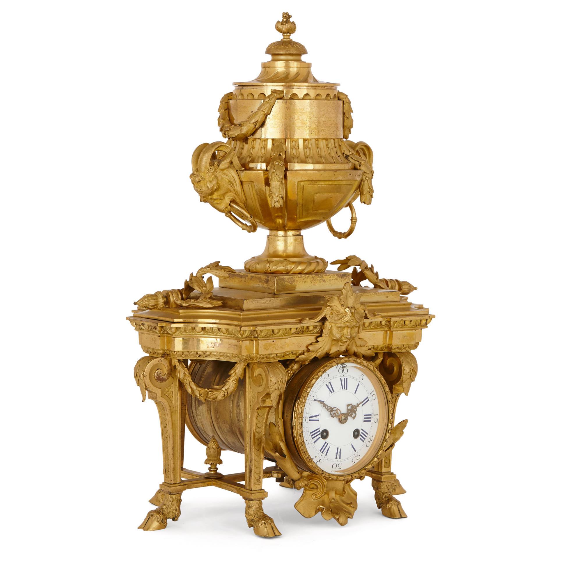 This mantel clock is a wonderful piece of French Neoclassical design. It is an unusual and very beautiful item, which has been expertly crafted from gilt bronze (ormolu). The clock will add elegance and sophistication to a mantelpiece. 

The clock