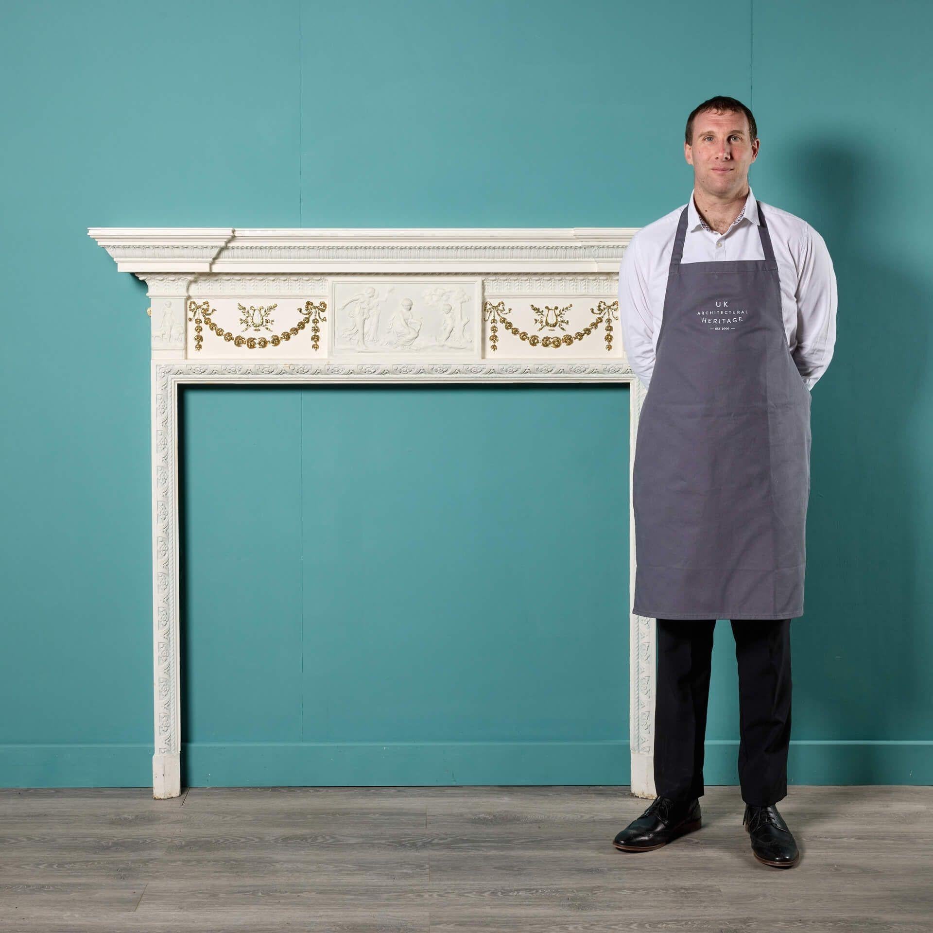 An antique Neoclassical style painted pine and composition fire mantel, sourced from a £13 million house in Hampstead, London.

This 19th century fireplace would make a stunning new feature for a period property, particularly of Neoclassical or