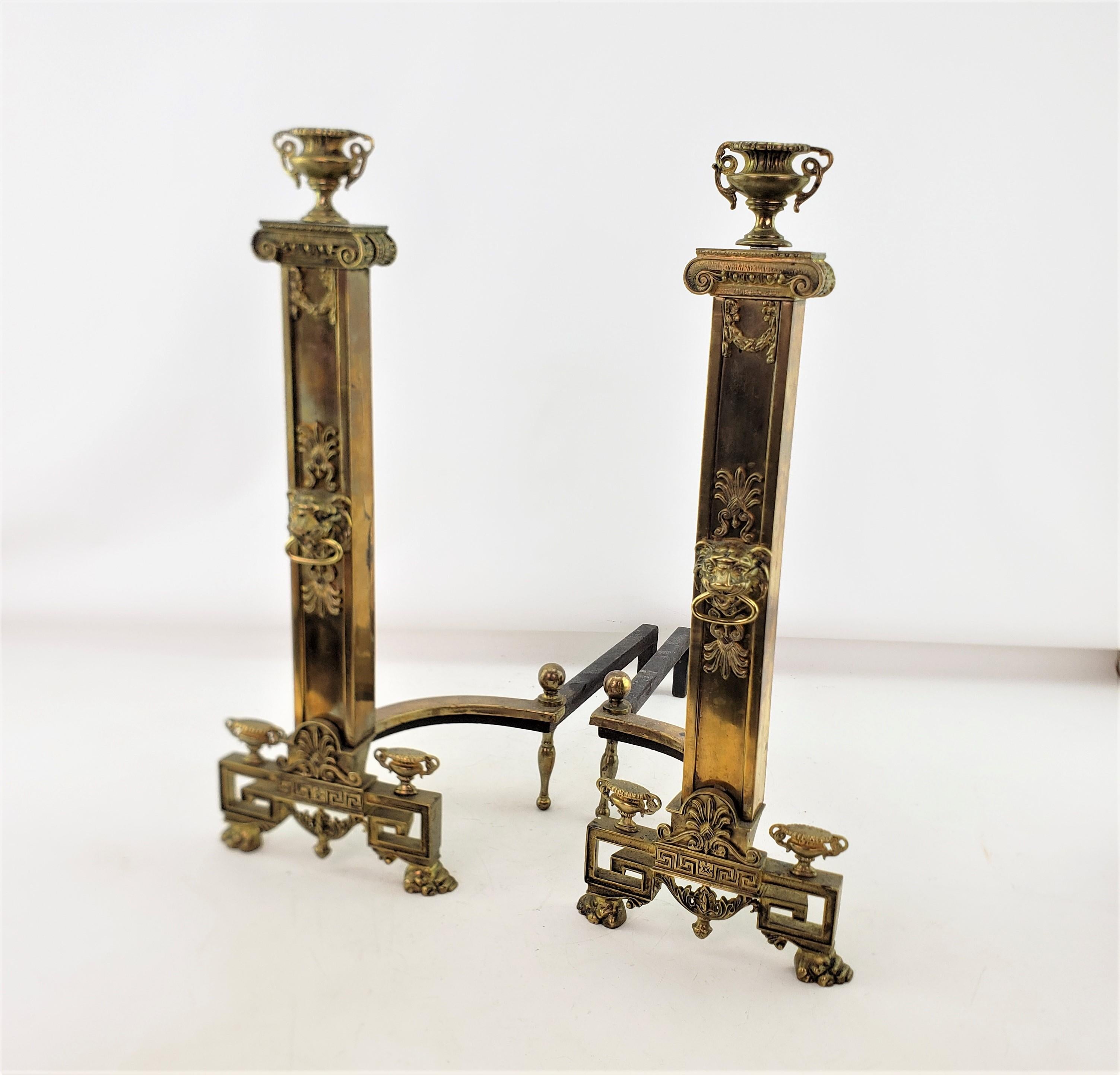 American Antique Neoclassical Styled Andirons with Brass Urns & Lion Head Accents For Sale
