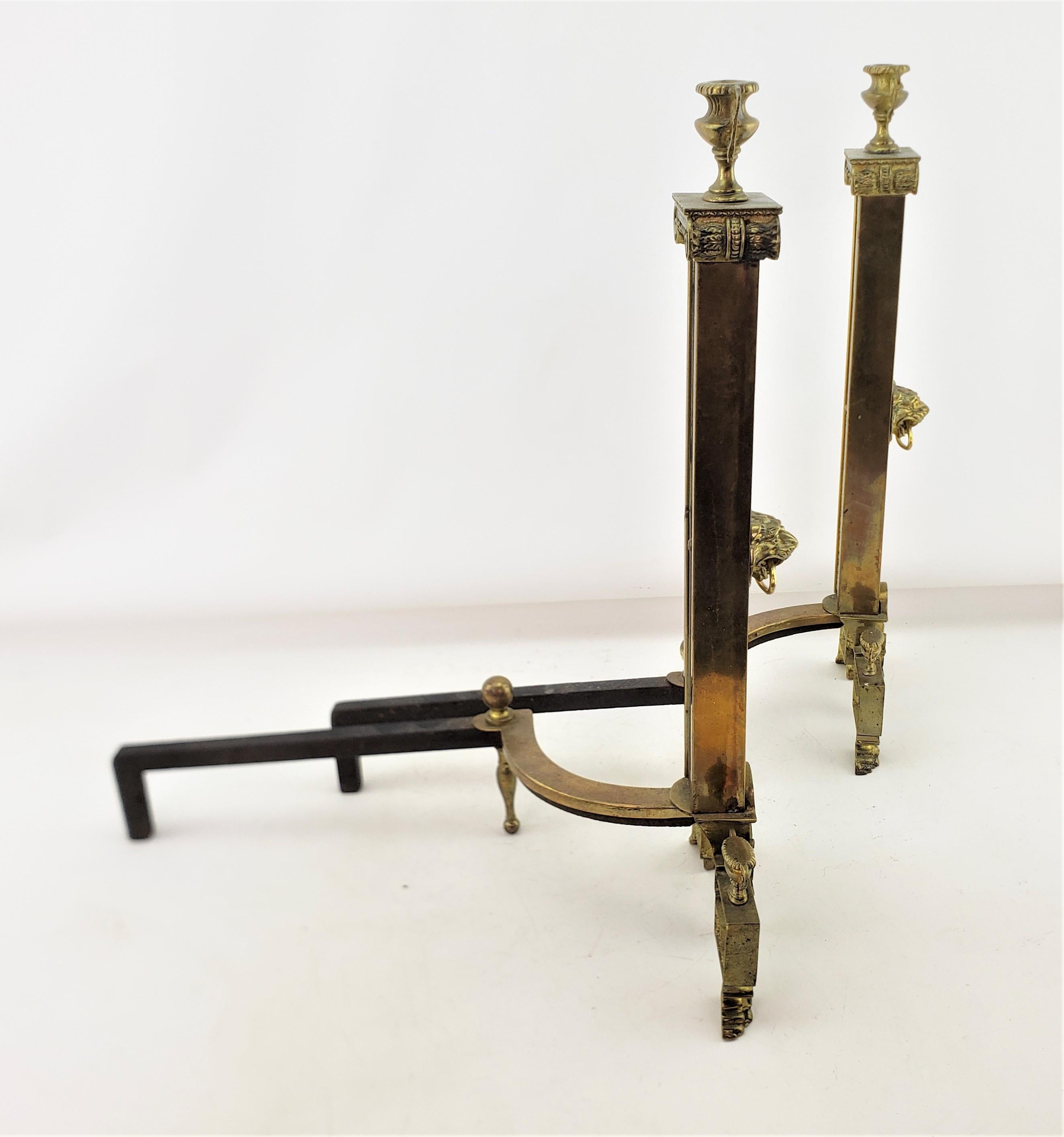 Antique Neoclassical Styled Andirons with Brass Urns & Lion Head Accents In Good Condition For Sale In Hamilton, Ontario