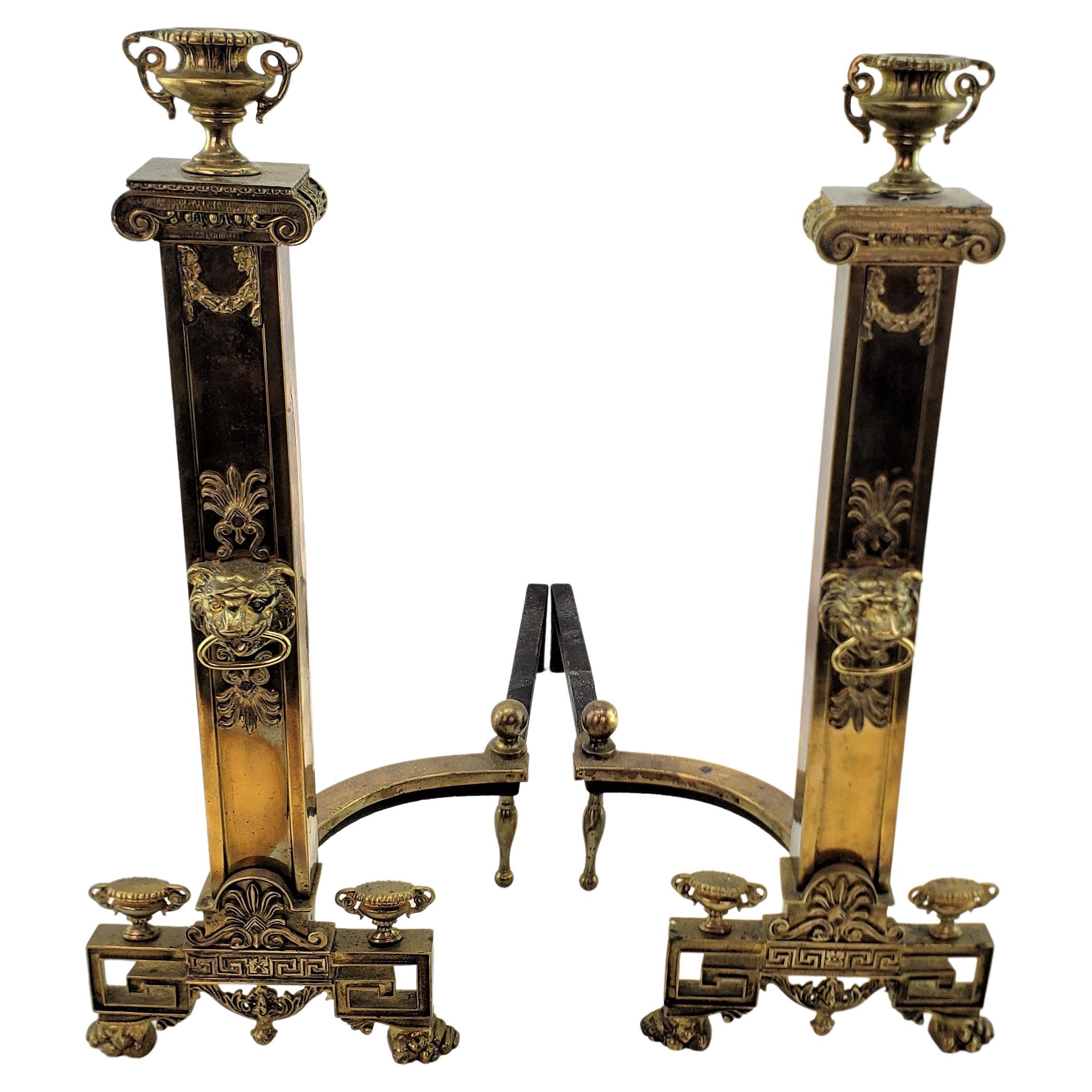 Antique Neoclassical Styled Andirons with Brass Urns & Lion Head Accents For Sale