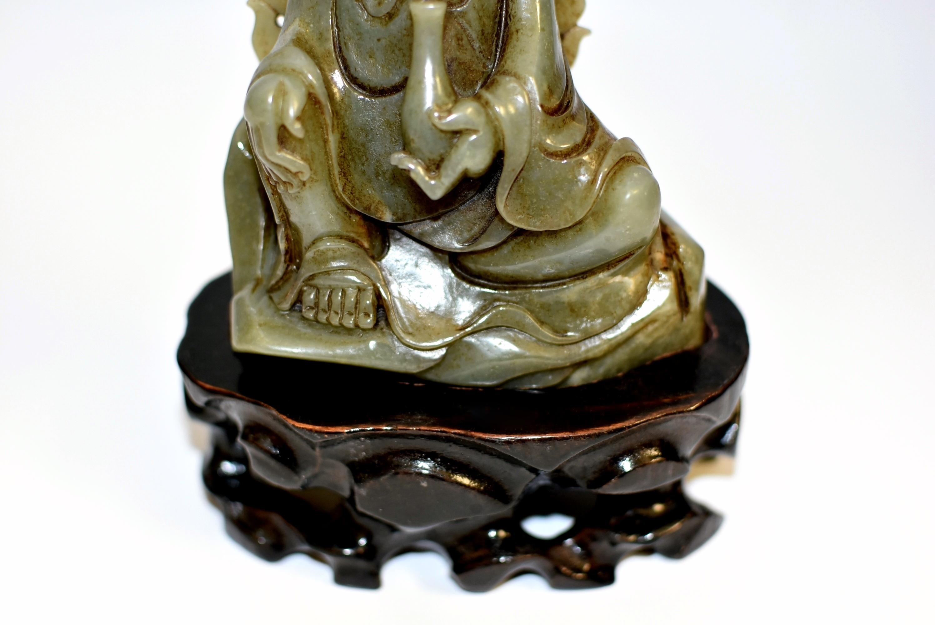 antique jade buddha statue
