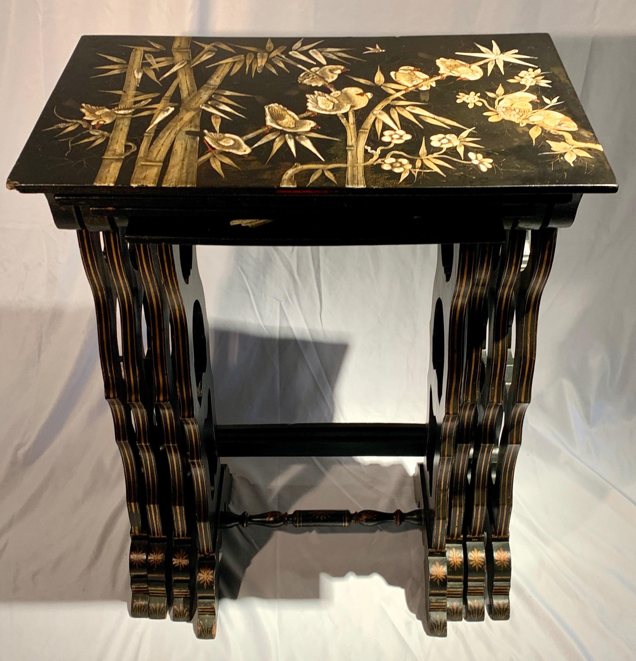 These are wonderfully decorated nesting tables. The tallest stands 30 inches high, 23 /12 inches wide and 14 1/2 inches deep.
The shortest stands 27 1/2 inches high, 15 1/4 inches wide and 12 1/2 inches deep.
Each table top of the four has a