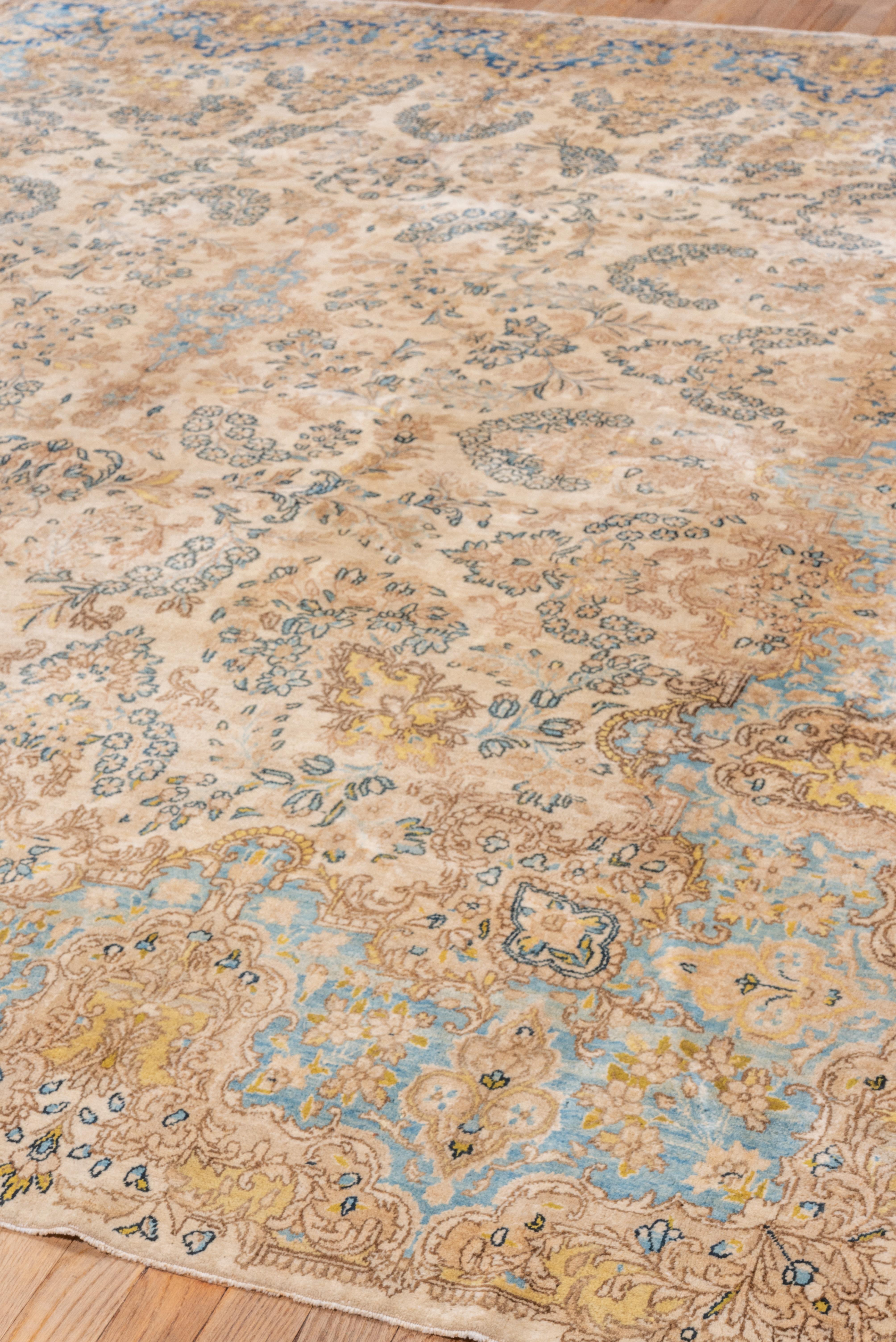 Hand-Knotted Antique Neutral Persian Kerman Carpet with Light Blue & Yellows Tones