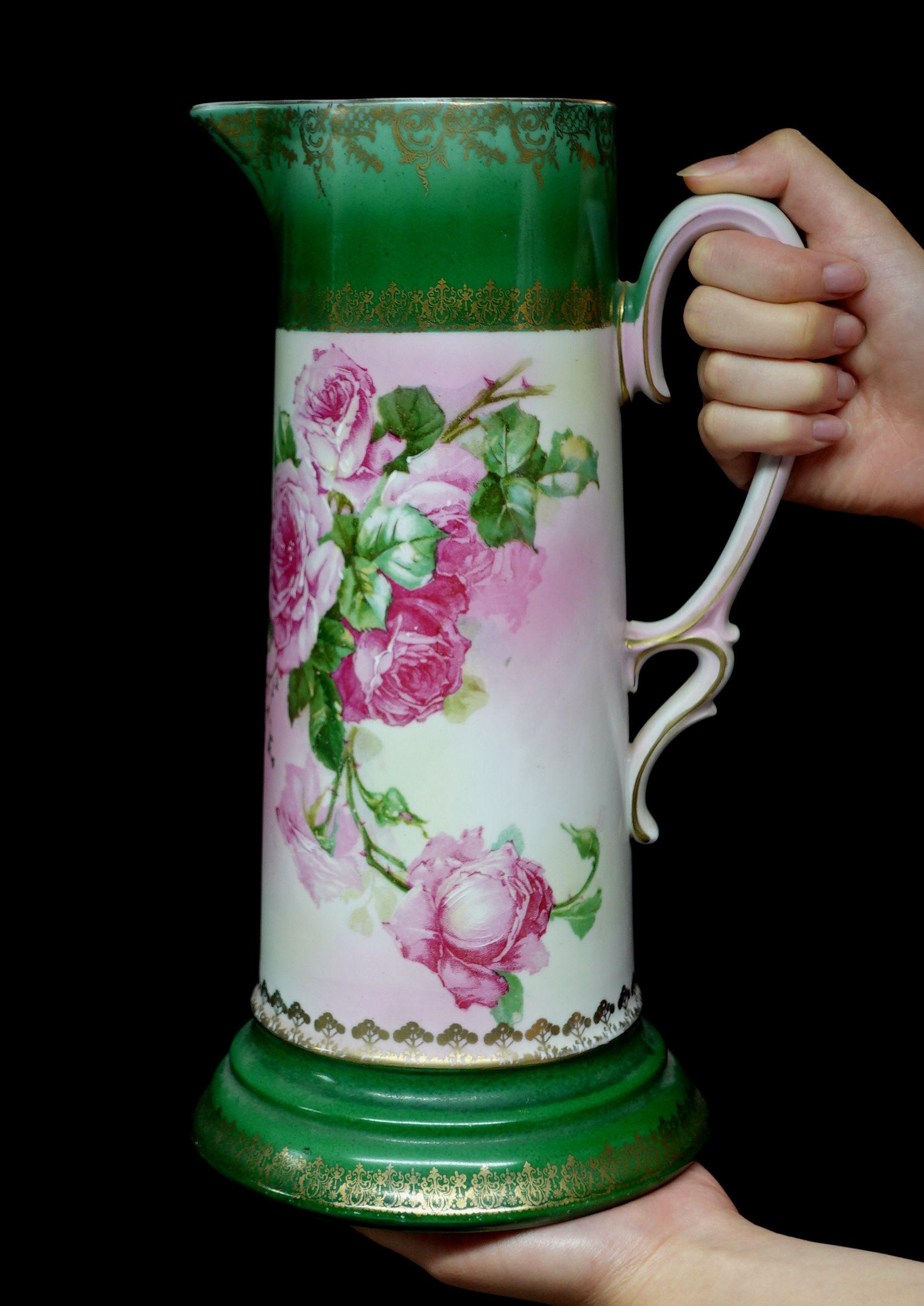A wonderful antique New Habsburg Austria Large Tankard absolutely 100% hand-painted floral, roses in red with rich green leaves presentation. The two colors of pink and light mixed together throughout the entire porcelain brings more attention to
